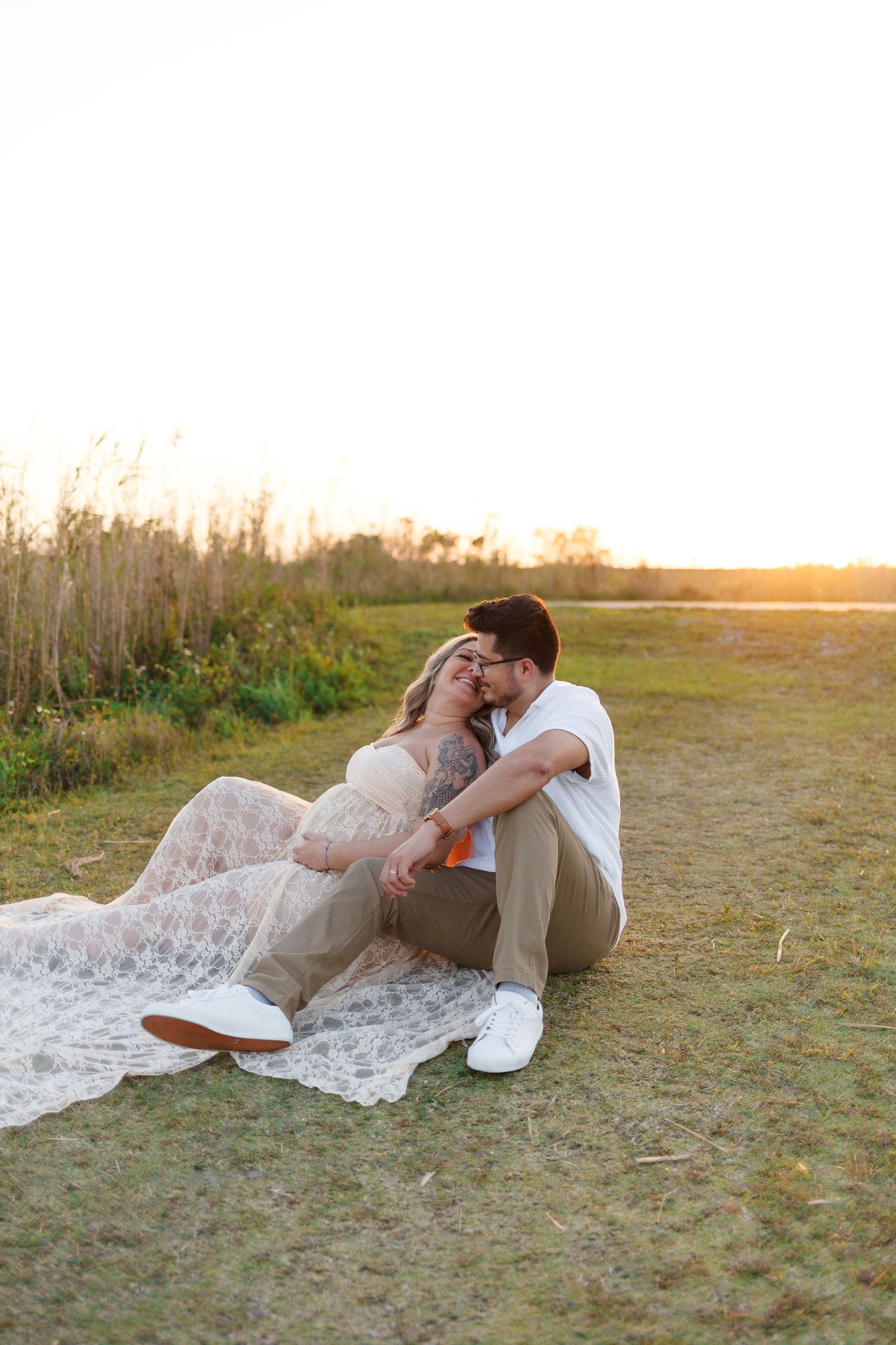 Maternity photoshoot in an open field