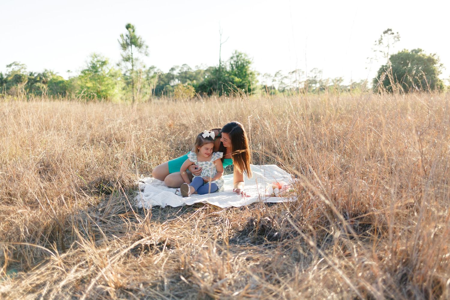 mommy and me photoshoot  white blanket open field