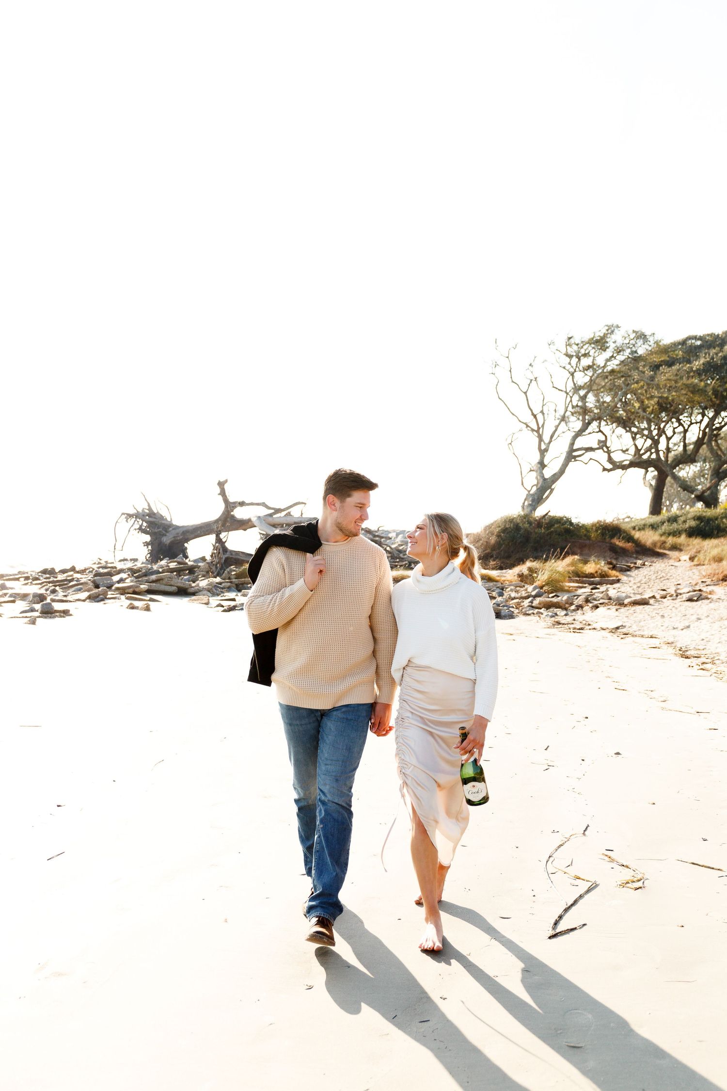 Engagement photos on the beach. Engagement and proposal photographer