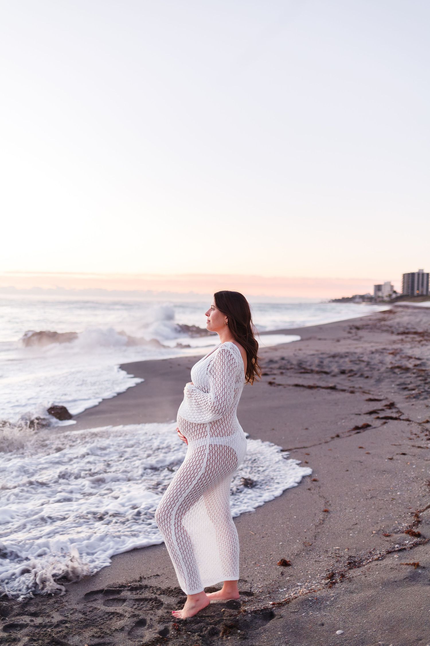 Maternity photoshoot at the beach sunrise