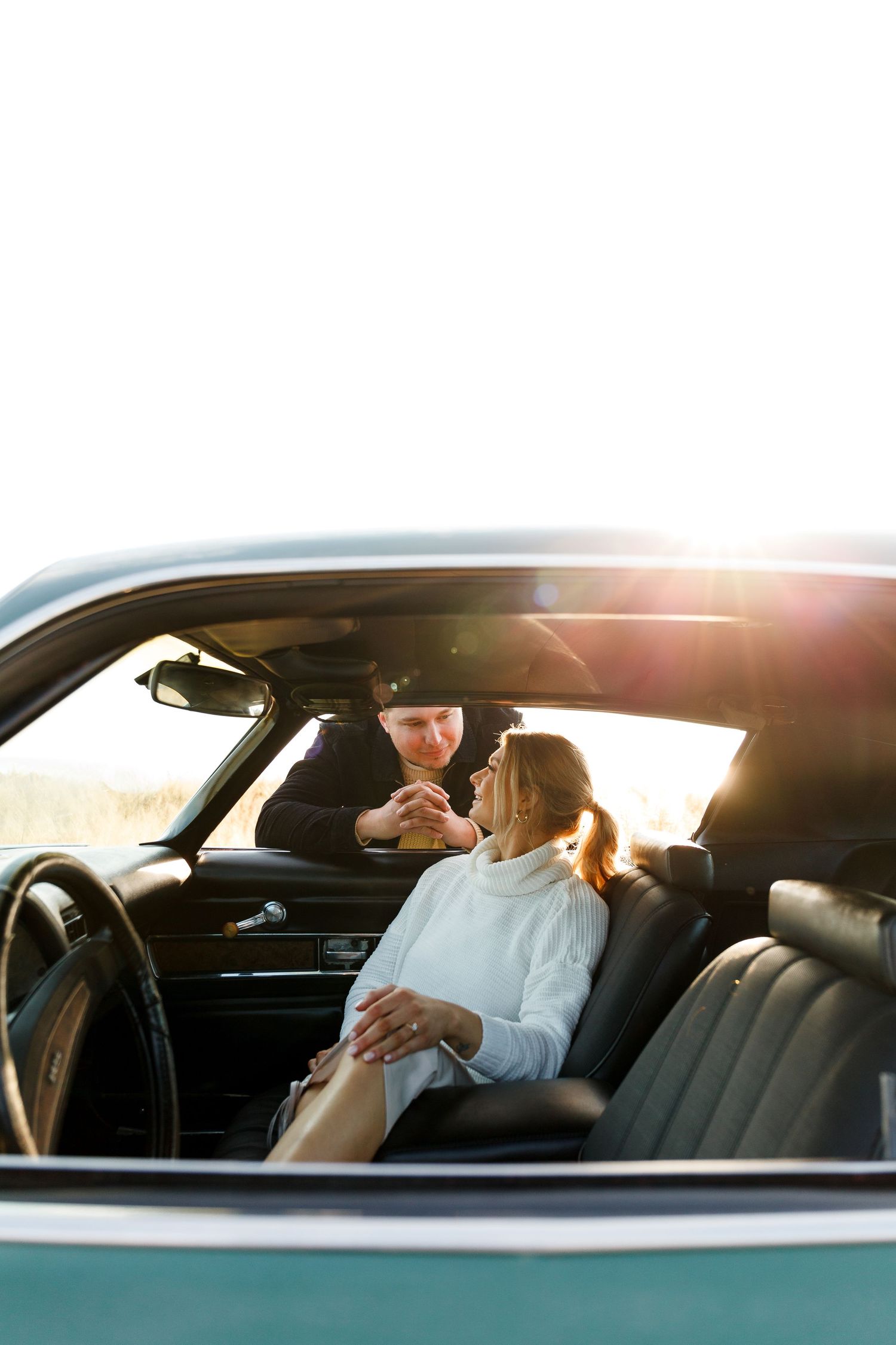 Engagement photos in an old car. Engagement photographer in south florida