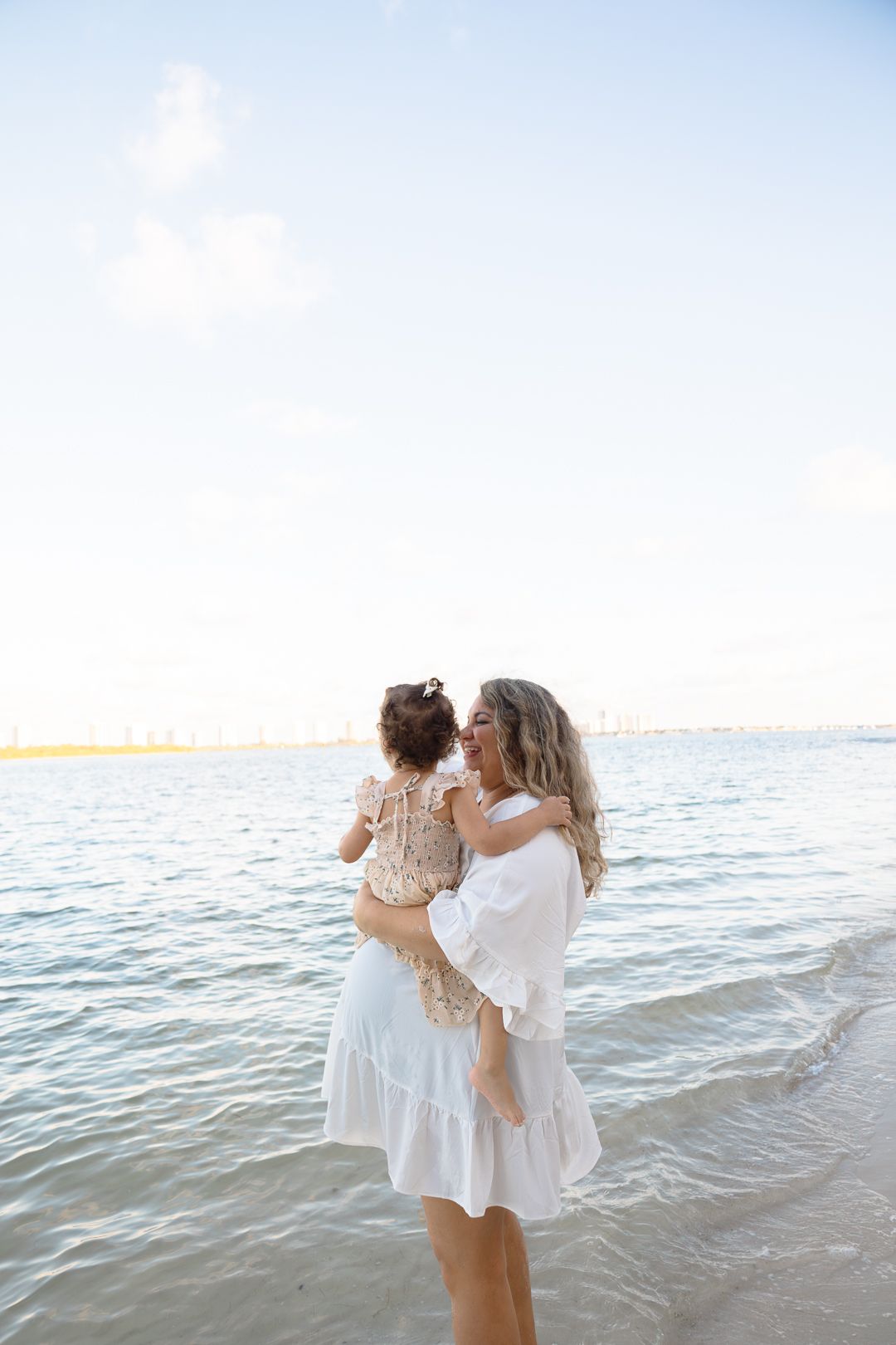 maternity photoshoot at the beach north palm beach in the water mom and toddler