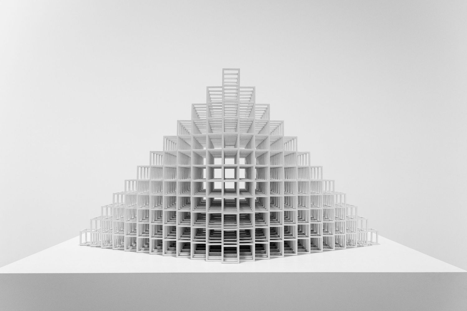 Abstract geometric cube sculpture at San Francisco Museum of Modern Art (SFMOMA), featuring minimalist symmetry and depth.