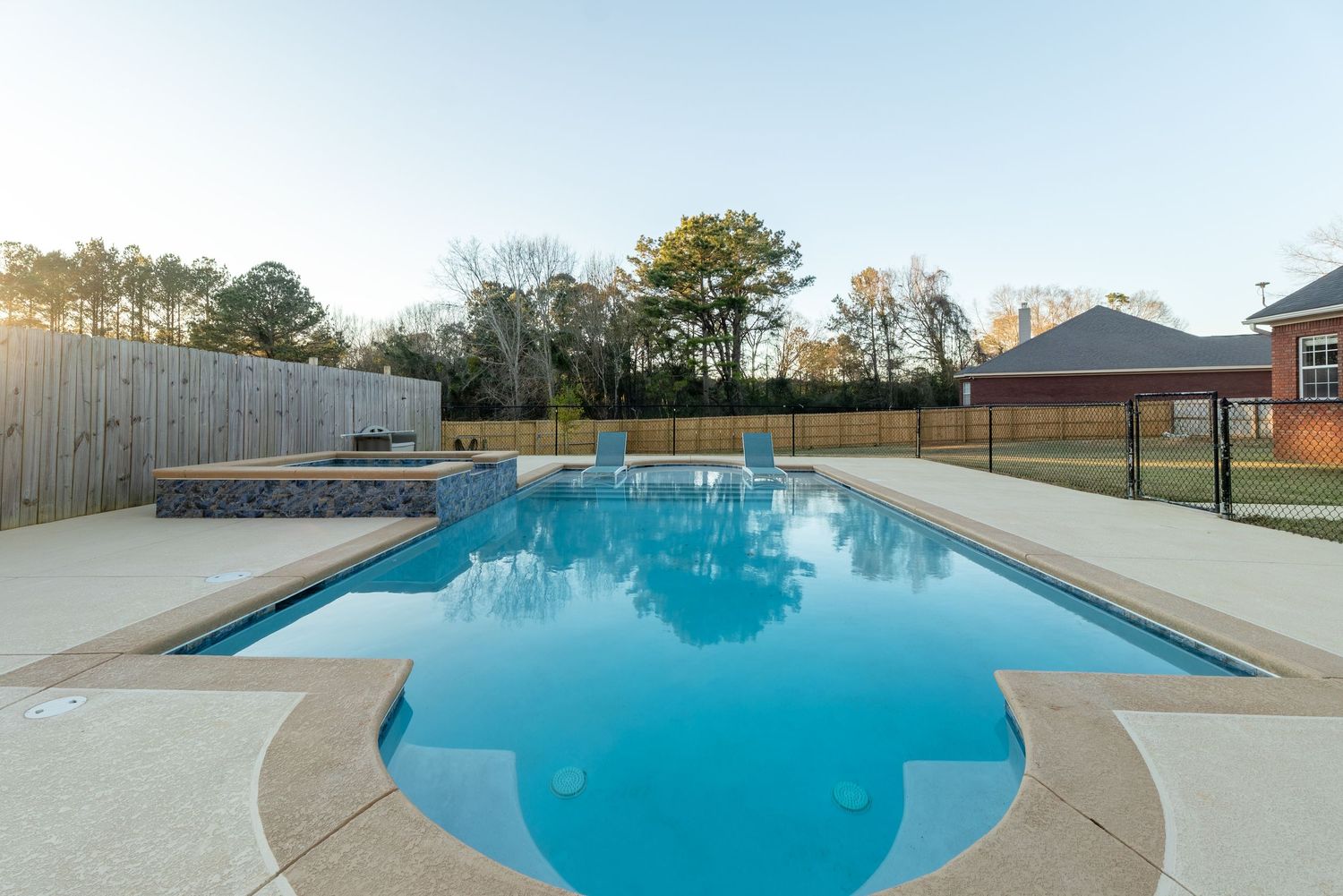 Dothan home with large lot and swimming pool.