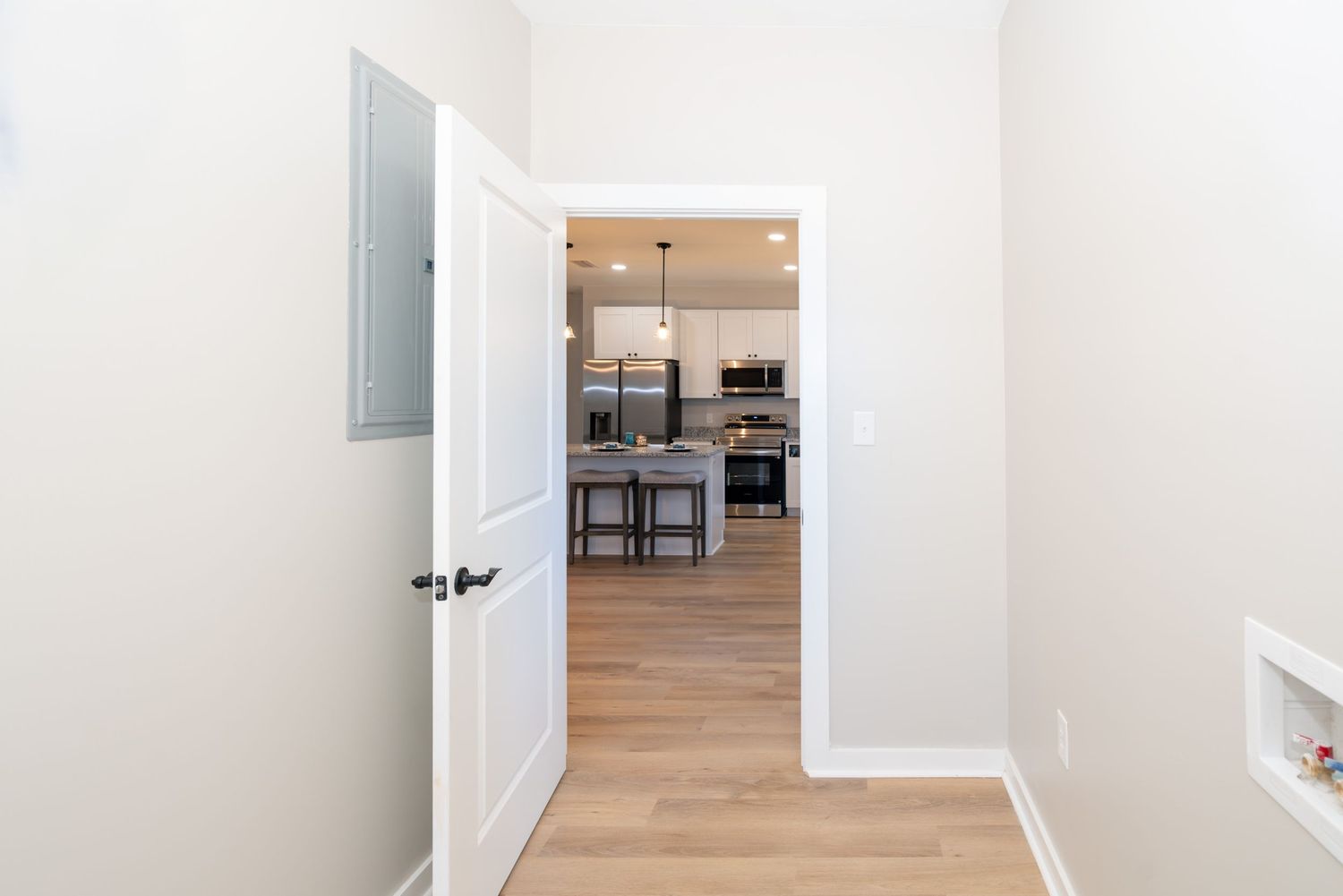 Laundry room in three bedroom, two bedroom new construction home in Newton.