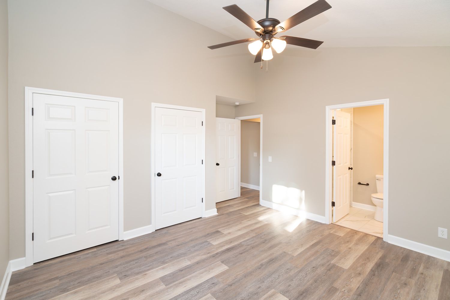 Double closets in primary suite near Fort Rucker.
