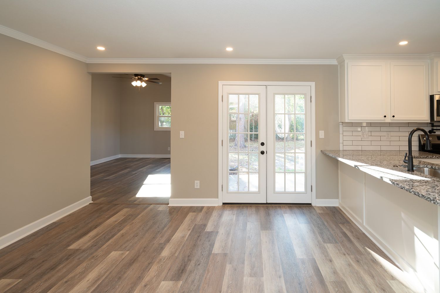 French doors to patio with large back yard in Enterprise subdivision.