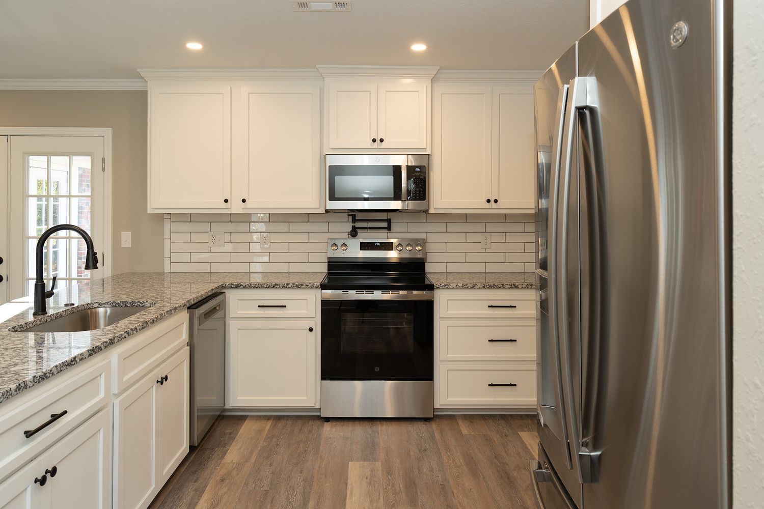 Electric stove with a pot holder.