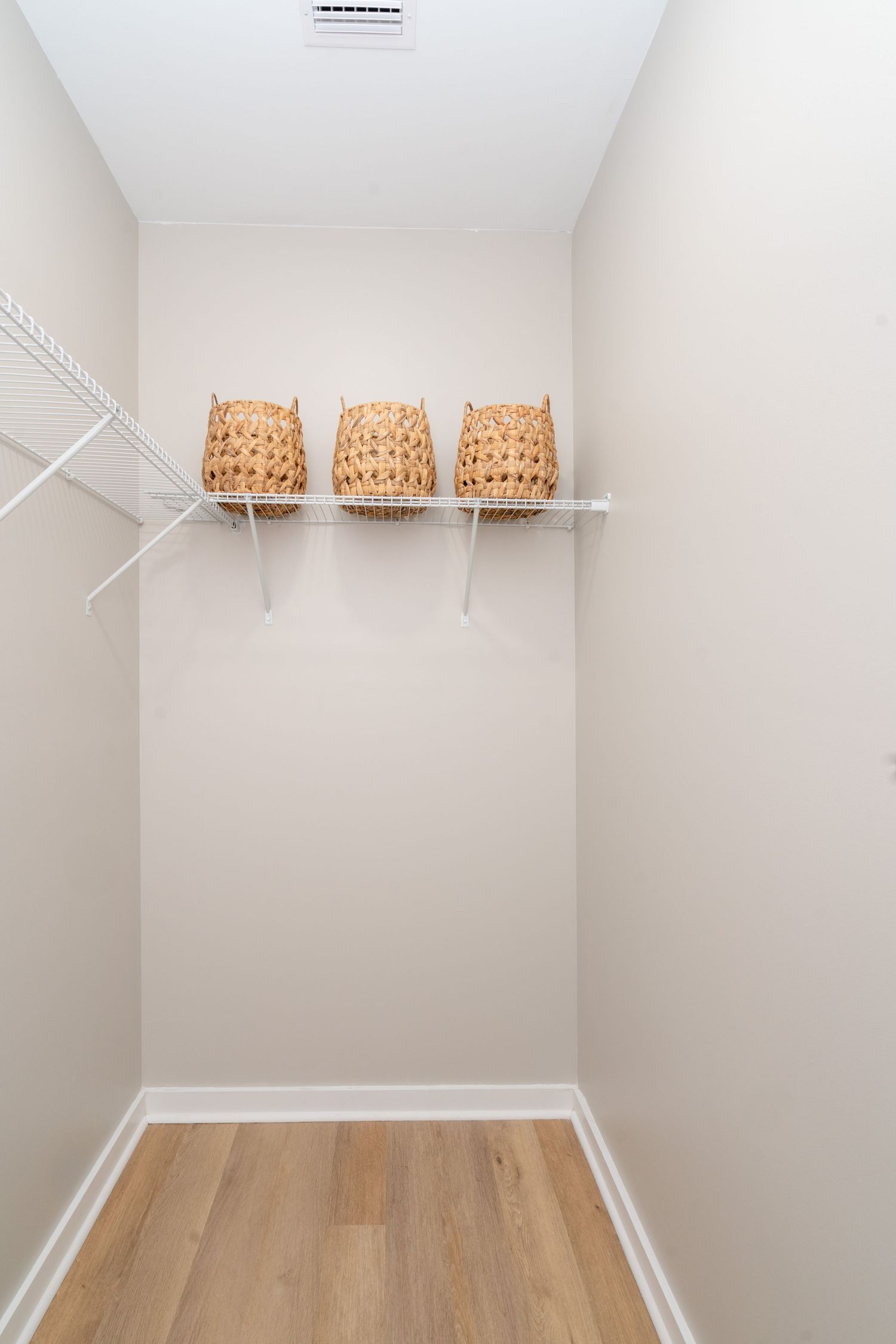 Walk-in closet in new construction in Newton.