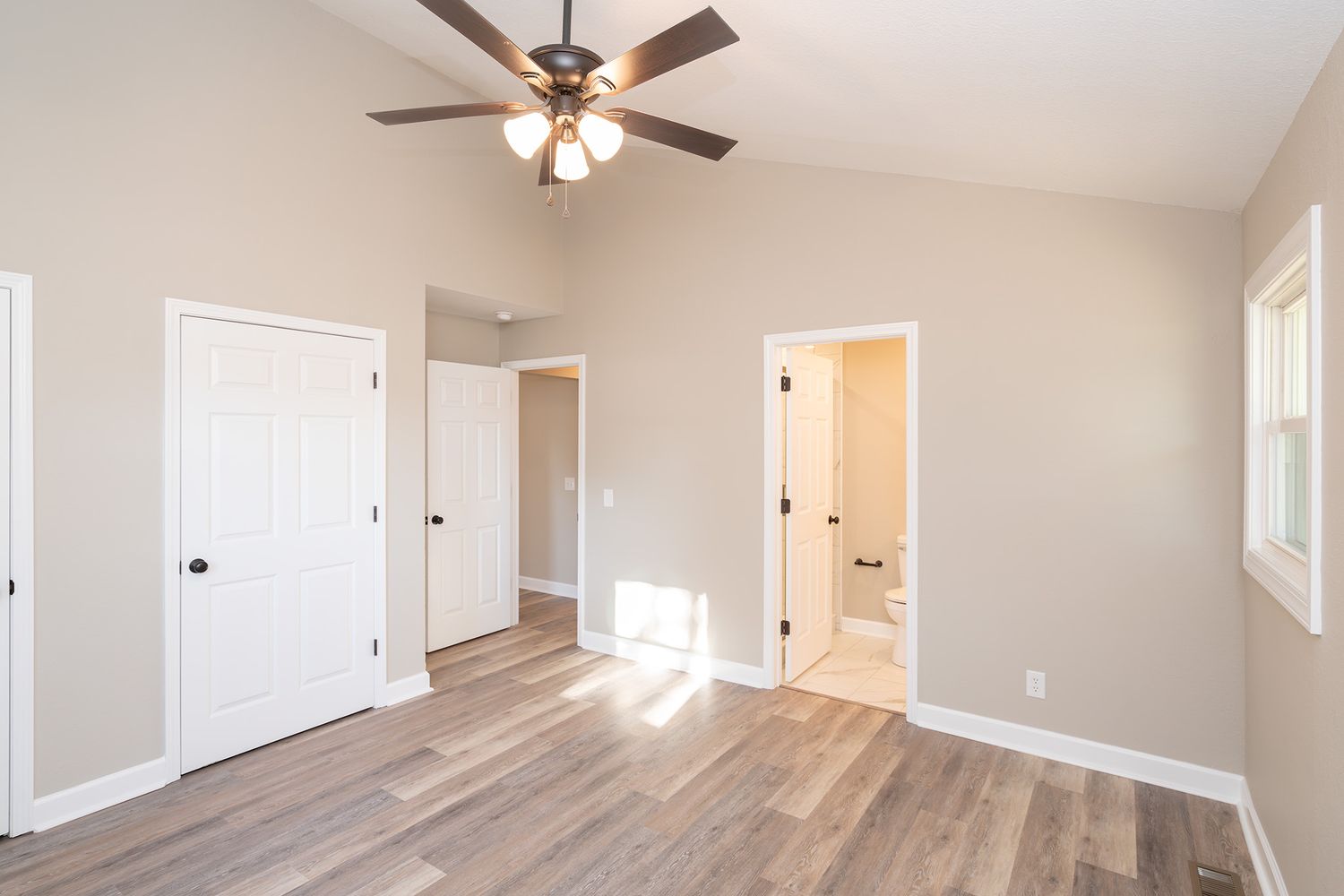 Primary suite in four bedroom house in Enterprise.