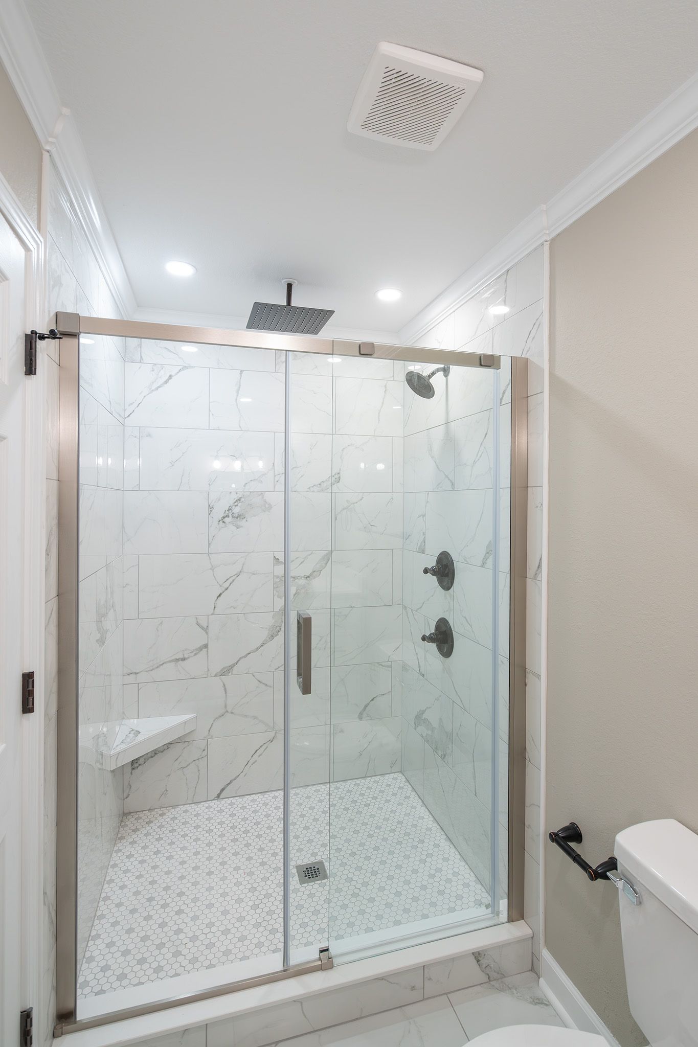 Luxurious tiled shower.