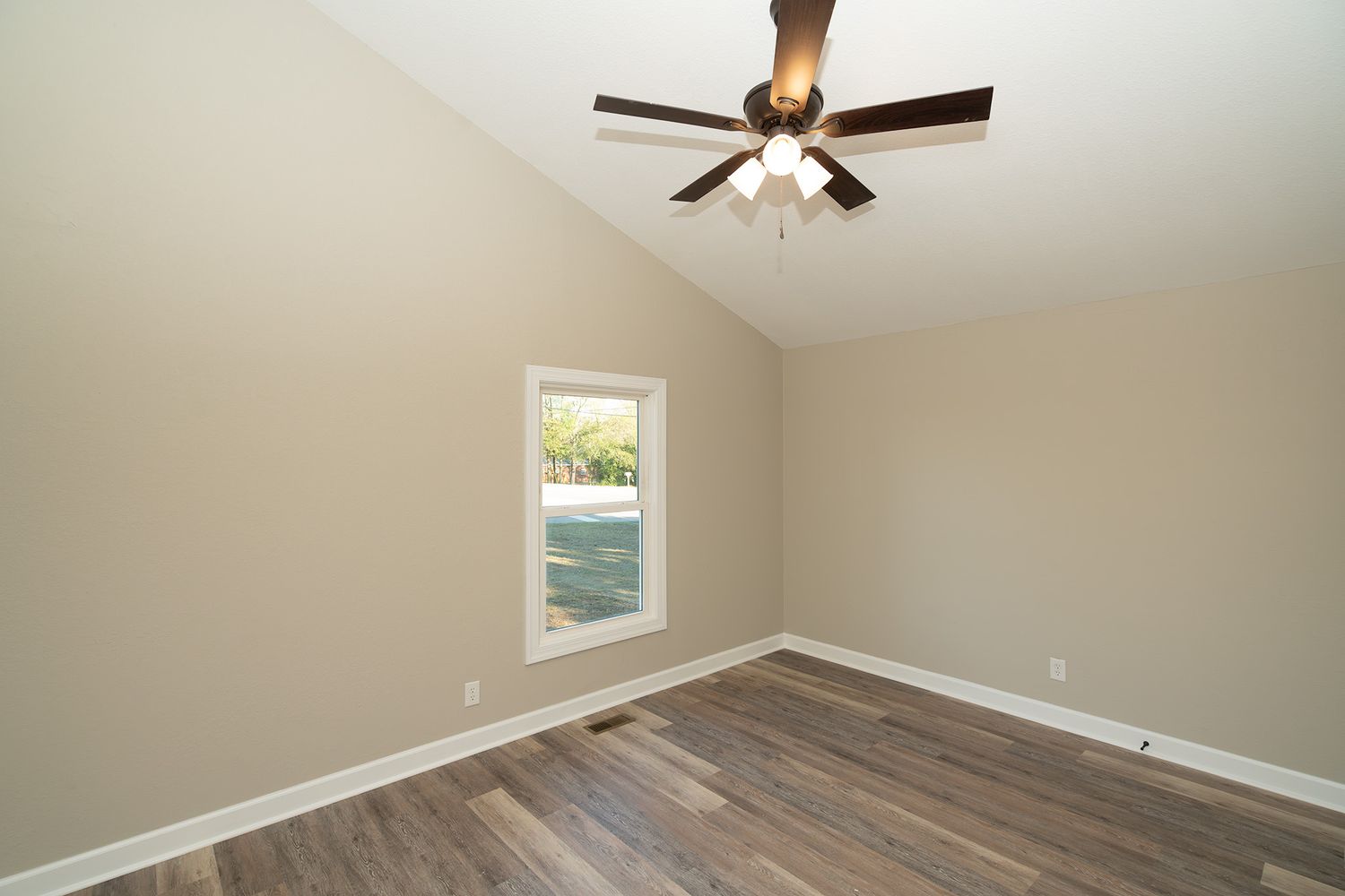 Large bedroom in four bedroom house in Enterprise.