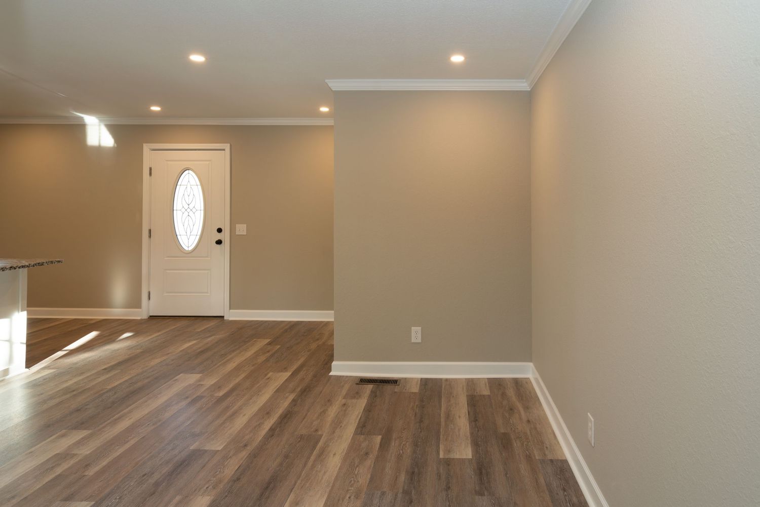 Entry and dining area with LVP.