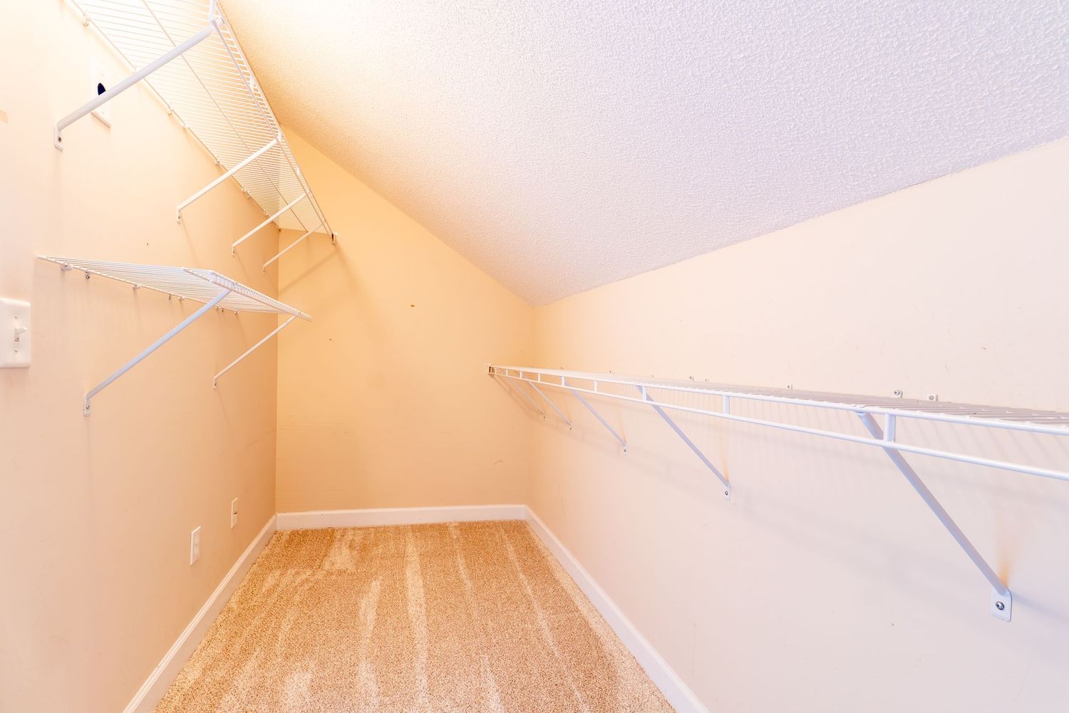 Large closet in Dothan home with saltwater pool.