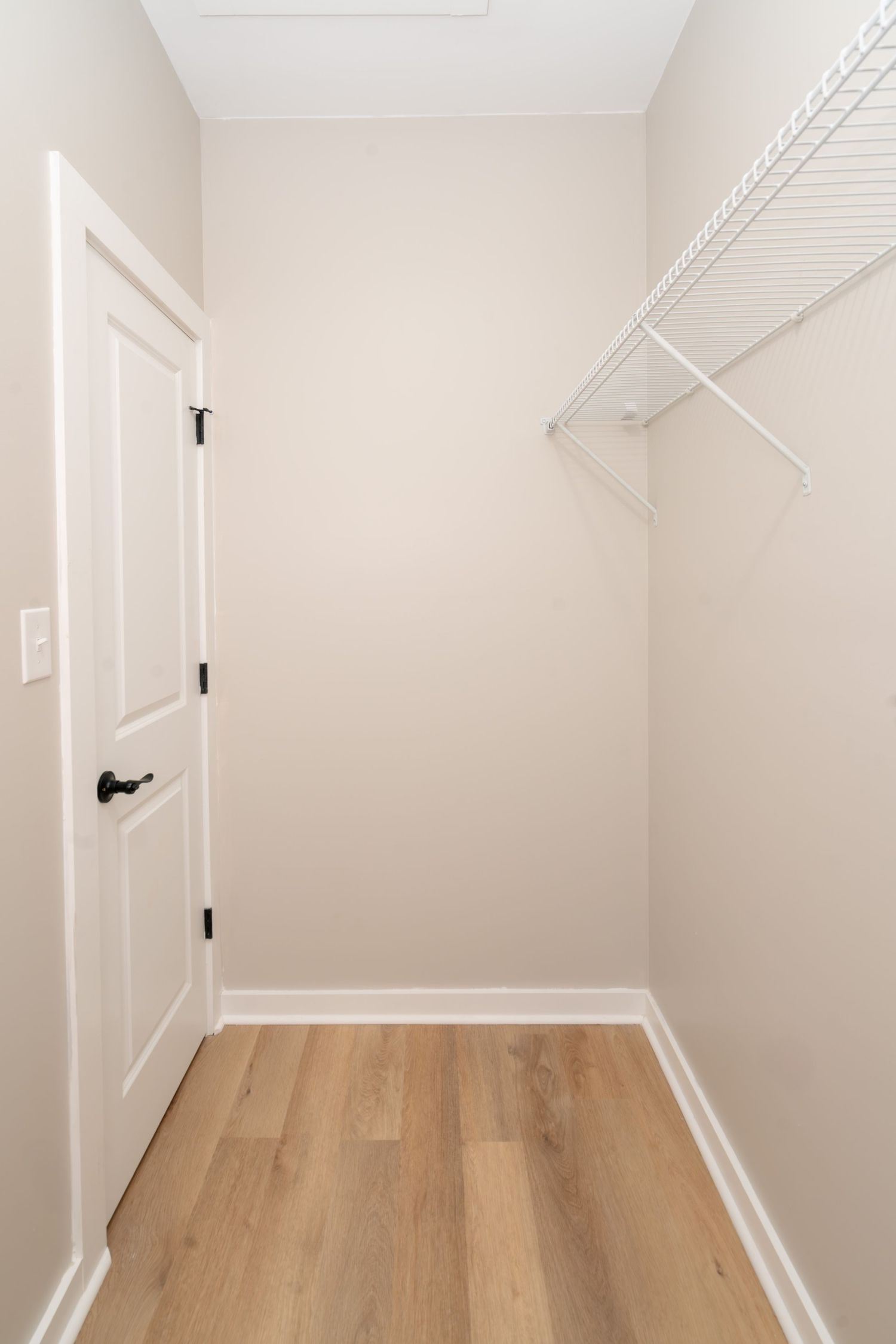 Walk in closet in new house in Newton.