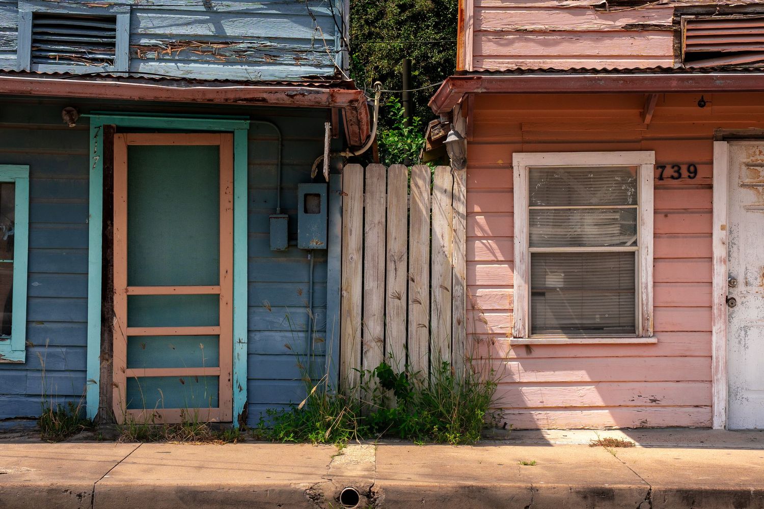 Two buildings on their last legs in Brownsville, Texas.
