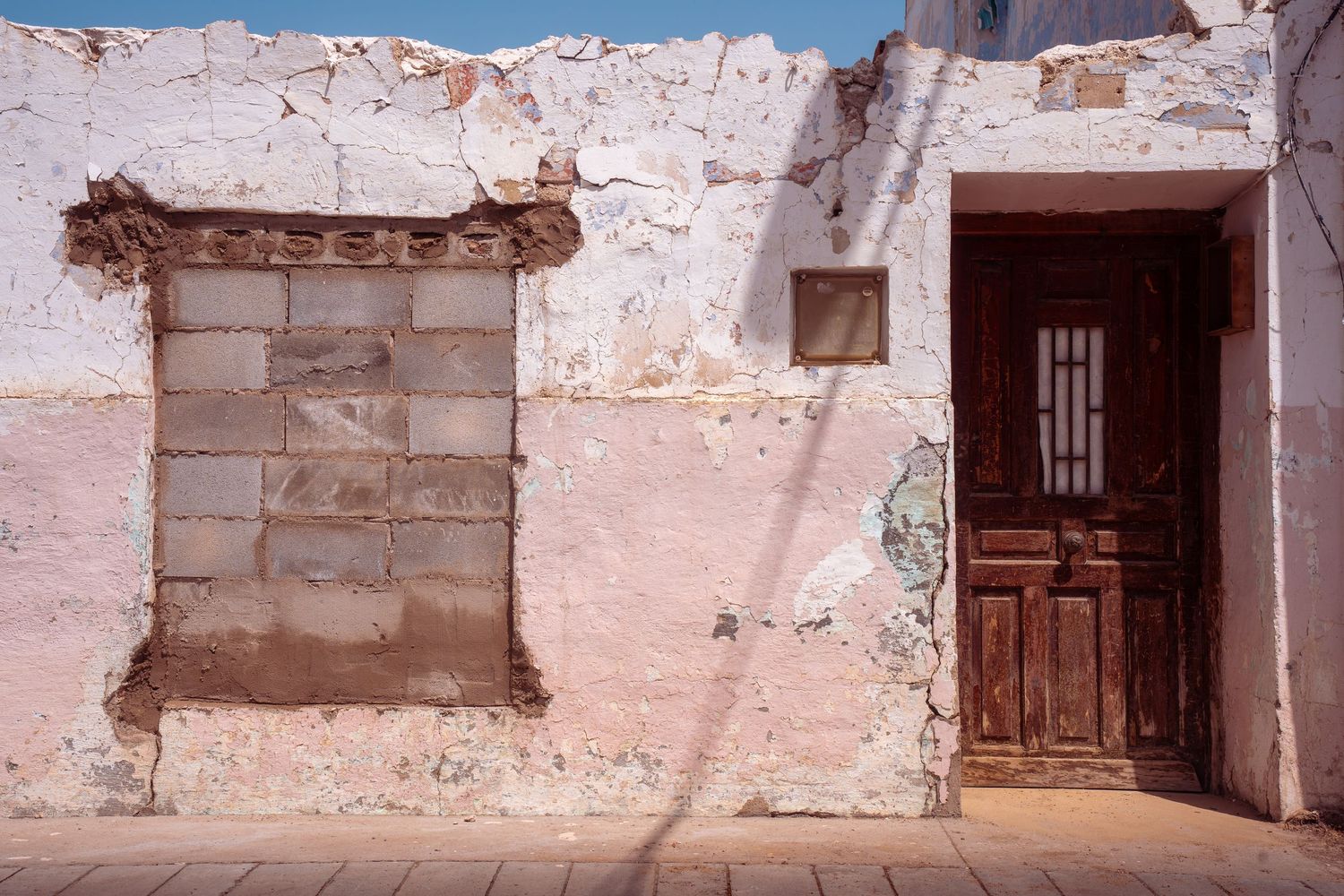 A crumbling building in a remote town.