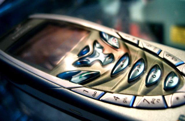 Colour photo of a old nokia phone, close-up.