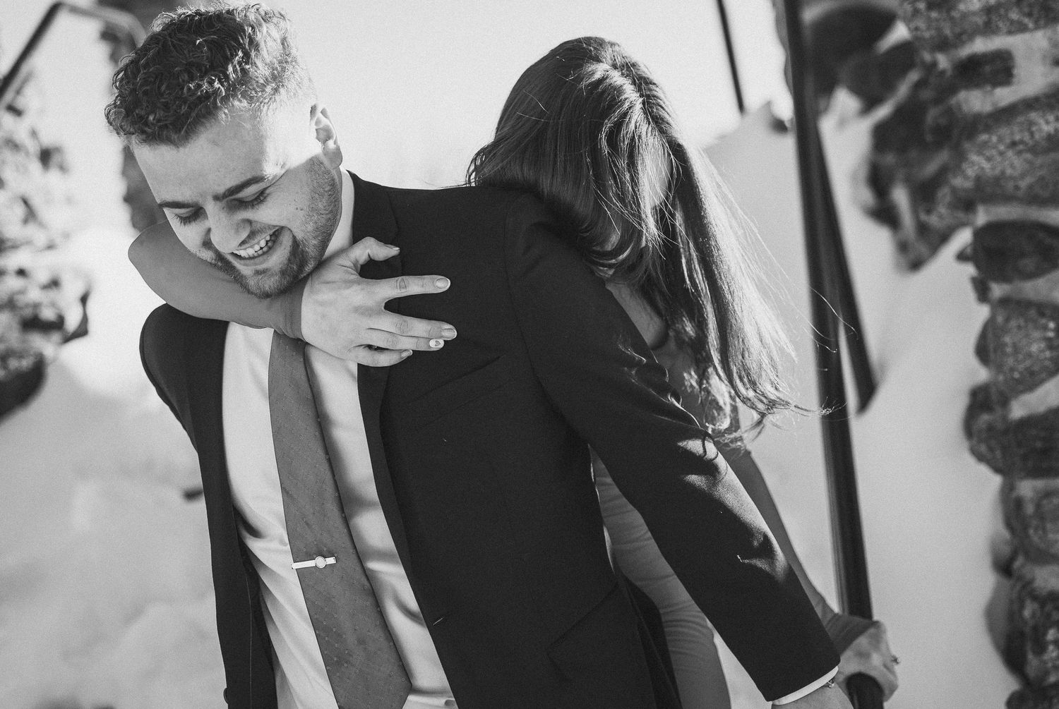 A romantic black and white wedding photo montage showing couples sharing intimate moments during their celebrations.