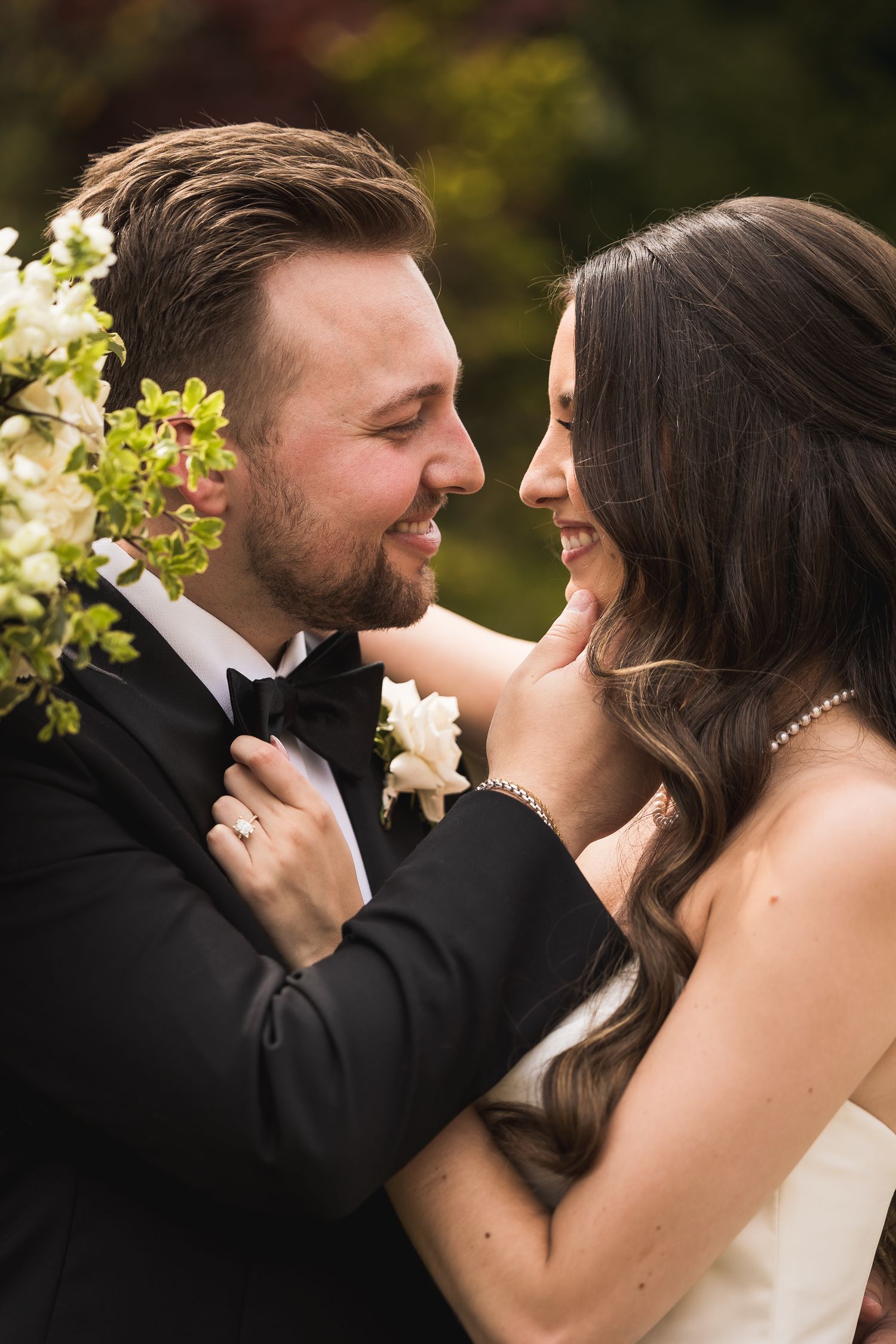 Romantic close-up sequence of newlyweds sharing intimate moments during outdoor wedding photography session.