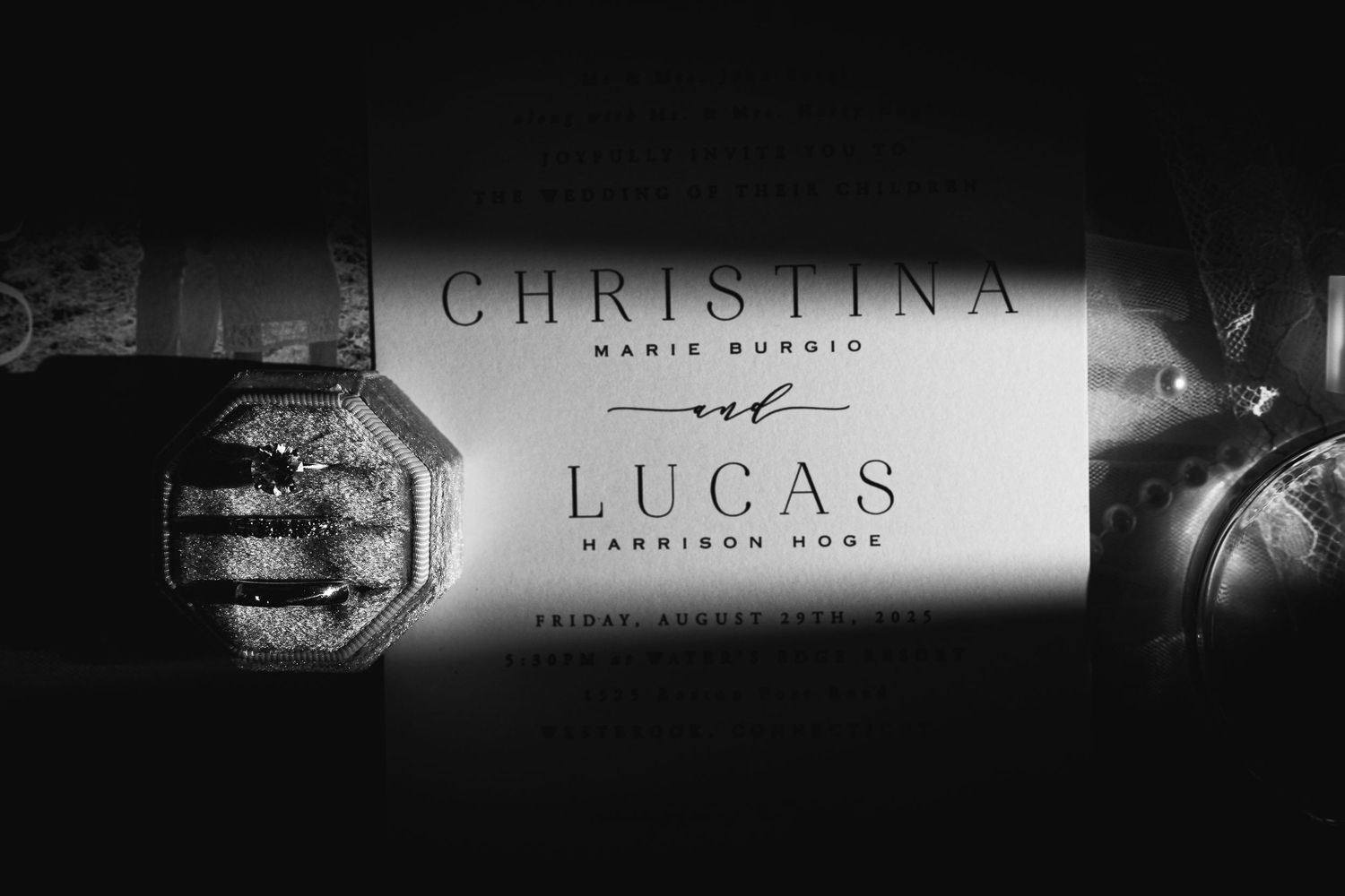 Professional photography branding displayed in dramatic black and white.