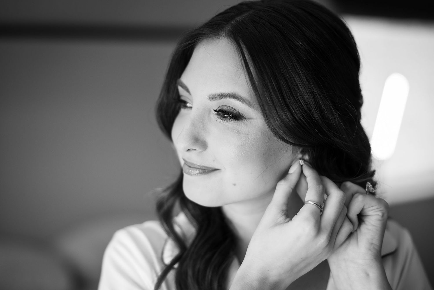 Black and white series of bridal preparation moments showing elegant details.