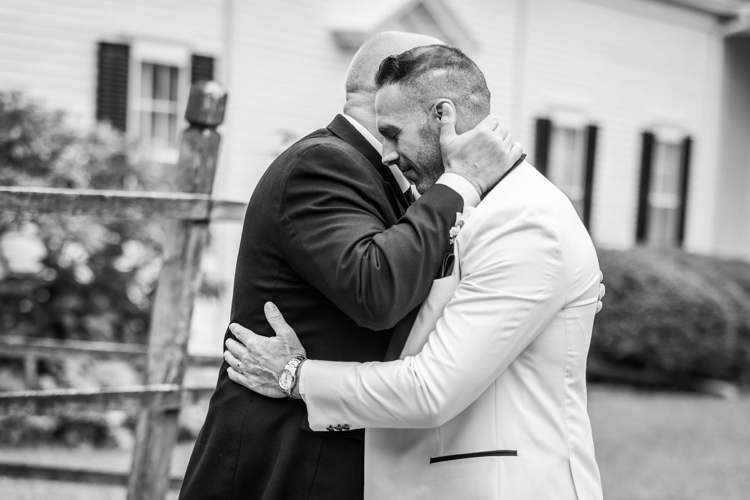 Black and white photos capturing intimate moments between wedding guests.