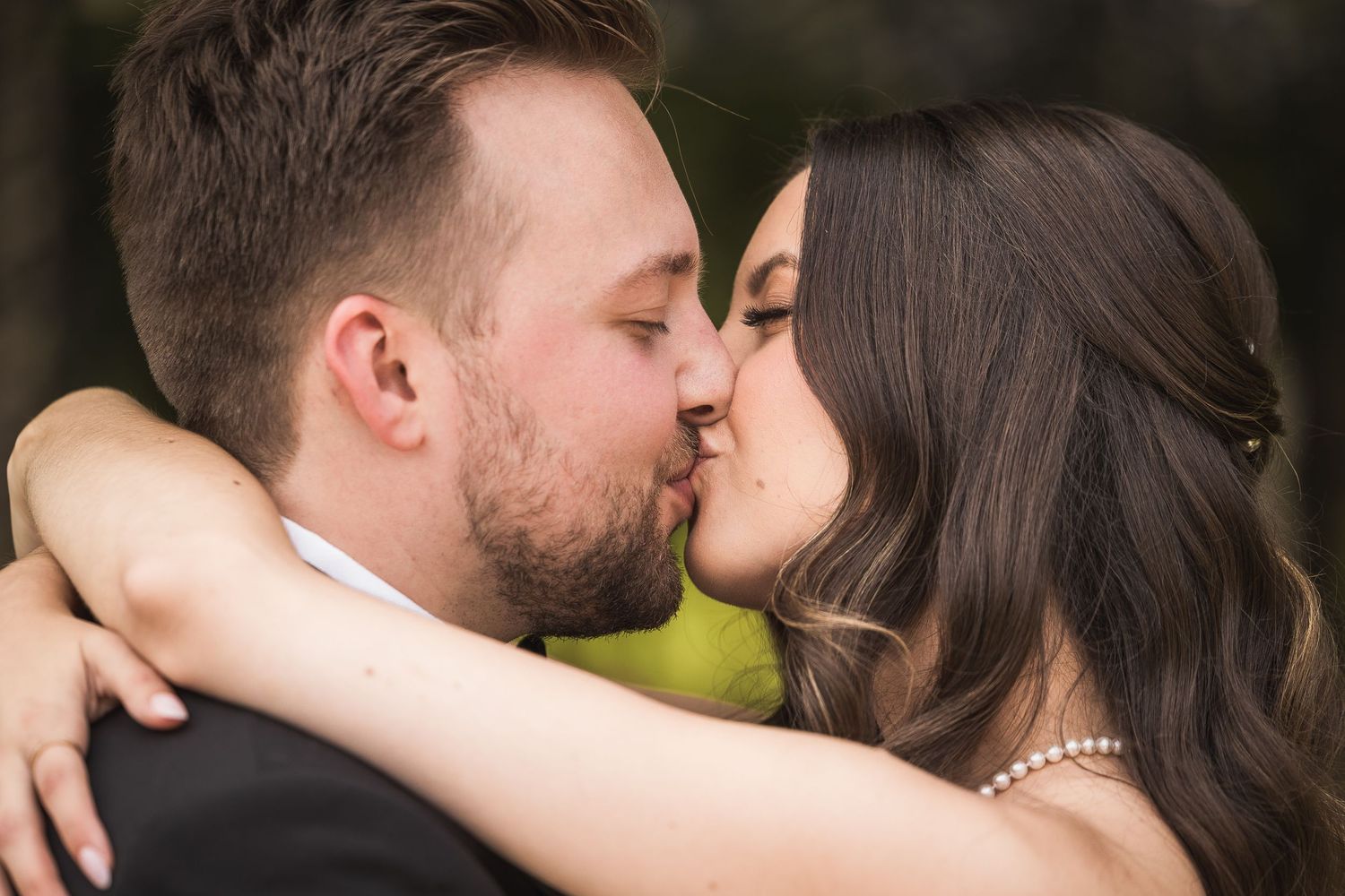 Series of intimate close-up shots showing tender moments between newlyweds.