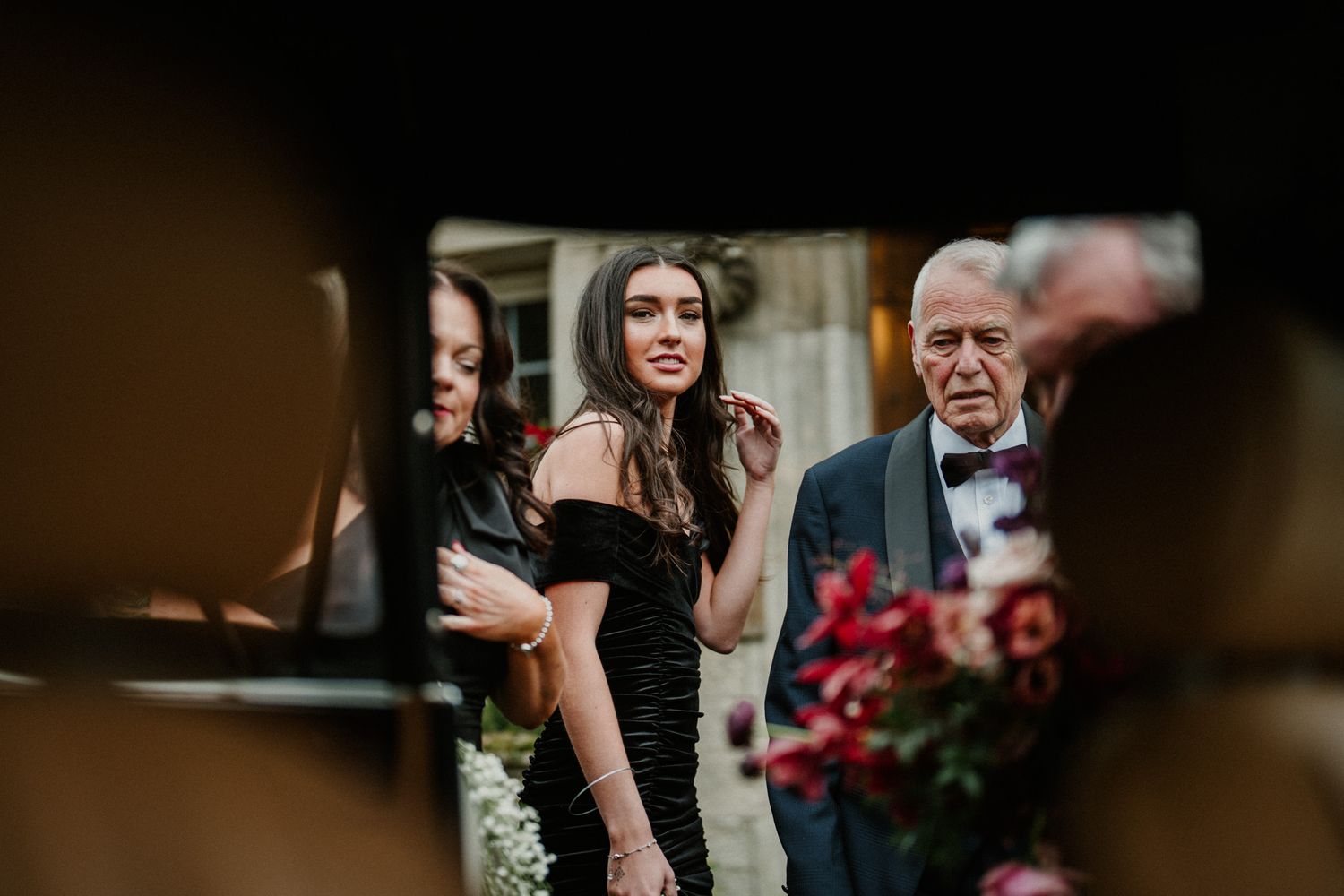 Candid moments captured during an indoor wedding ceremony.