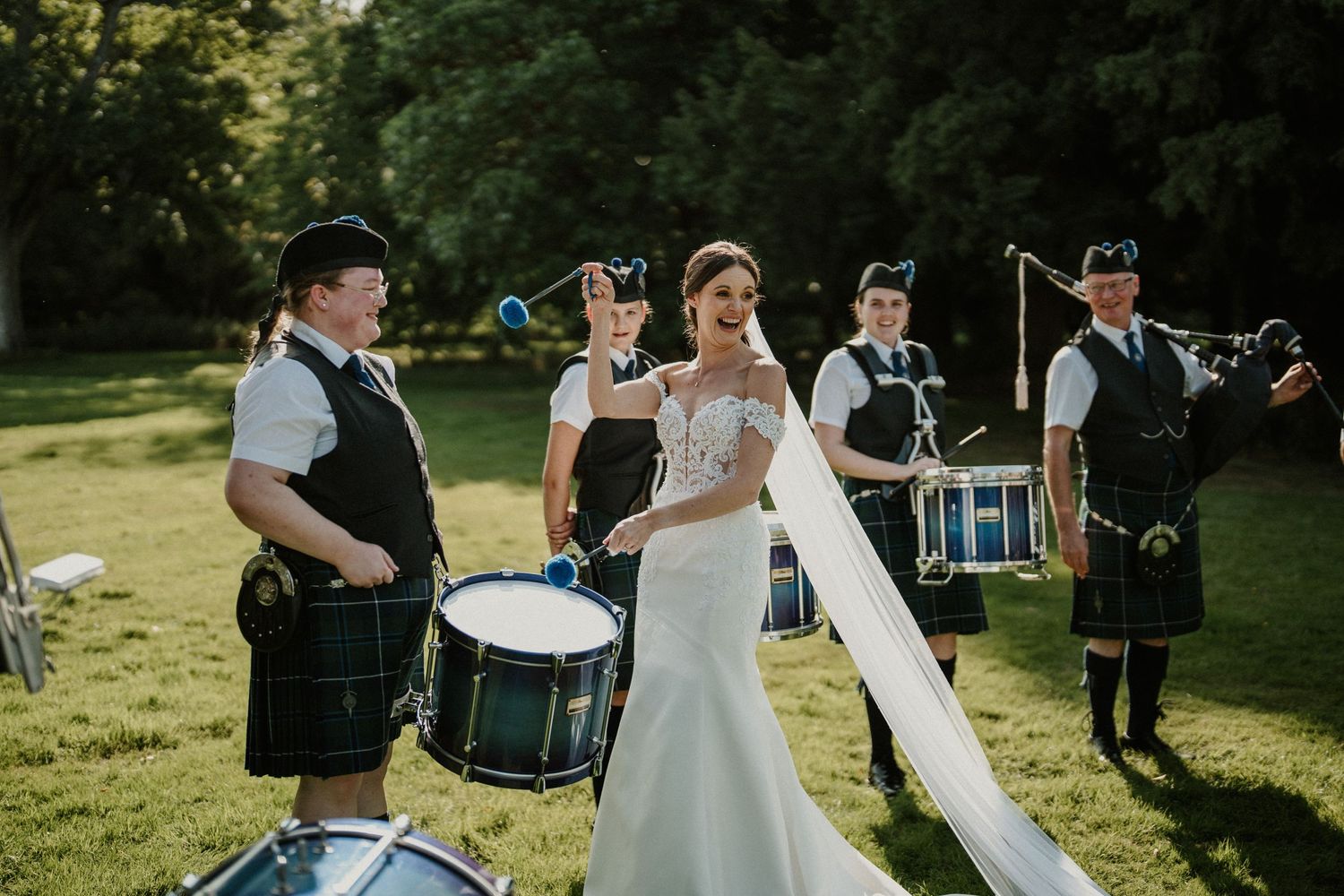 Outdoor wedding ceremony with Scottish traditions at historic castle venue.