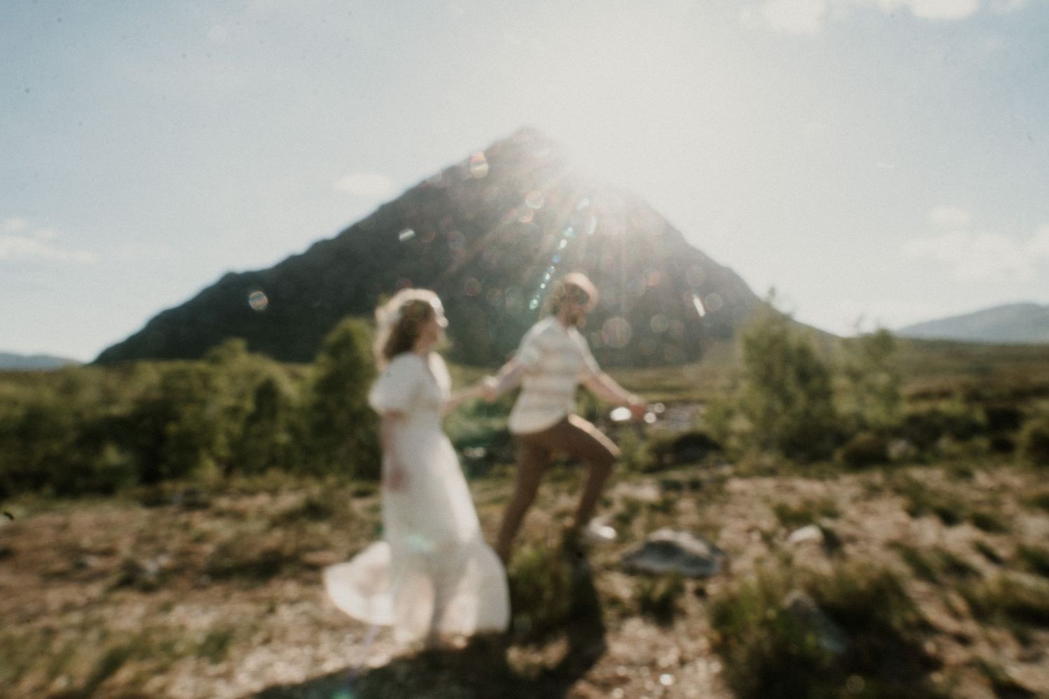 Wedding photography session in a scenic mountain setting with natural light.