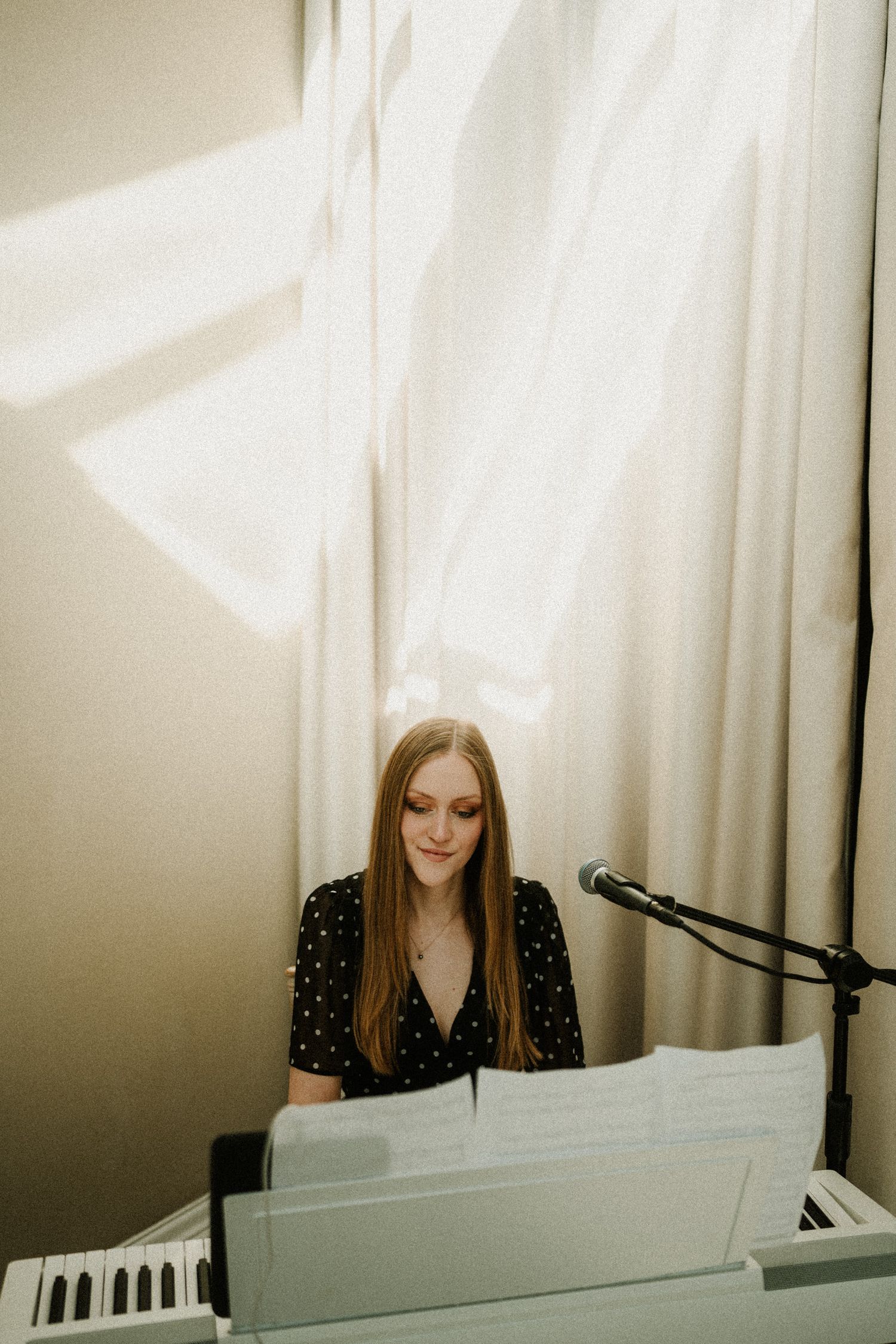 Artistic shots of musician playing white piano in sunlit room.
