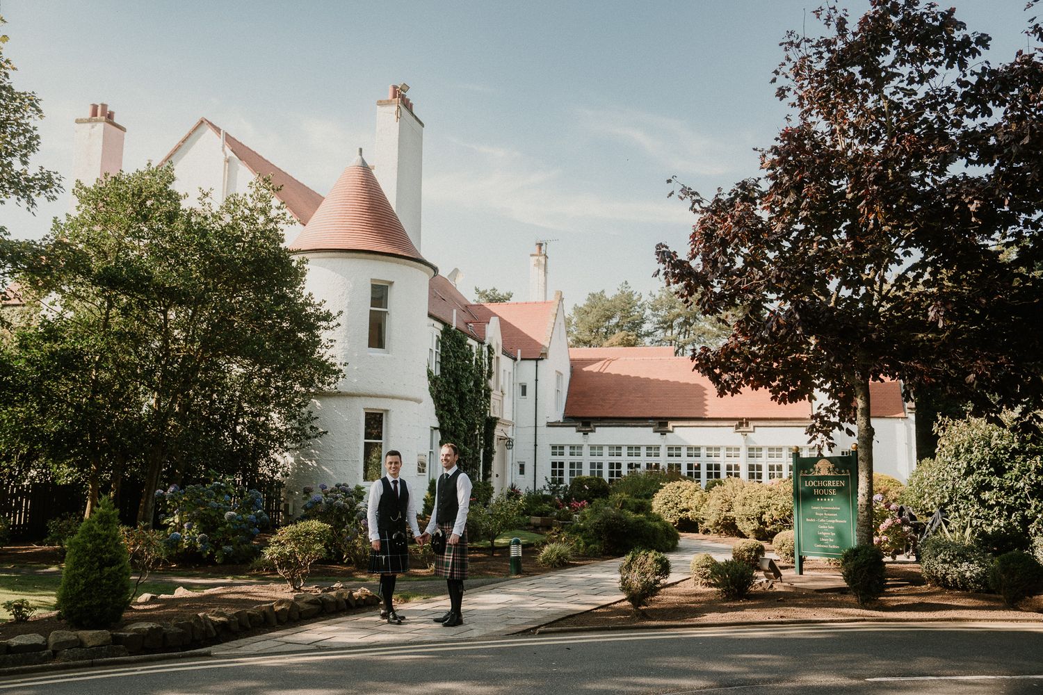 A Scottish wedding venue featuring white walls and distinctive terracotta turrets.