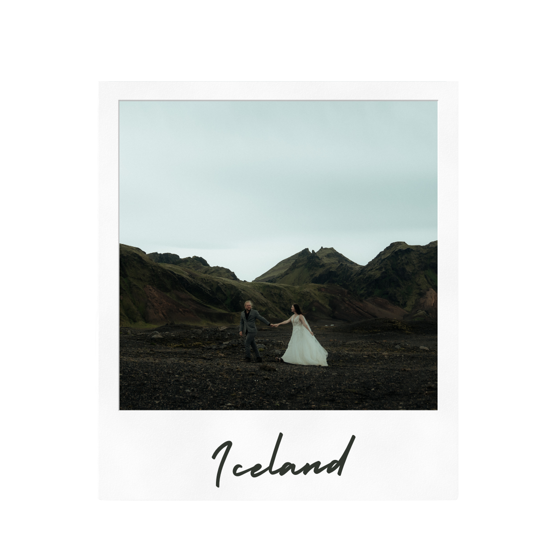 A wedding couple stands in silhouette against rolling hills in Iceland's landscape.