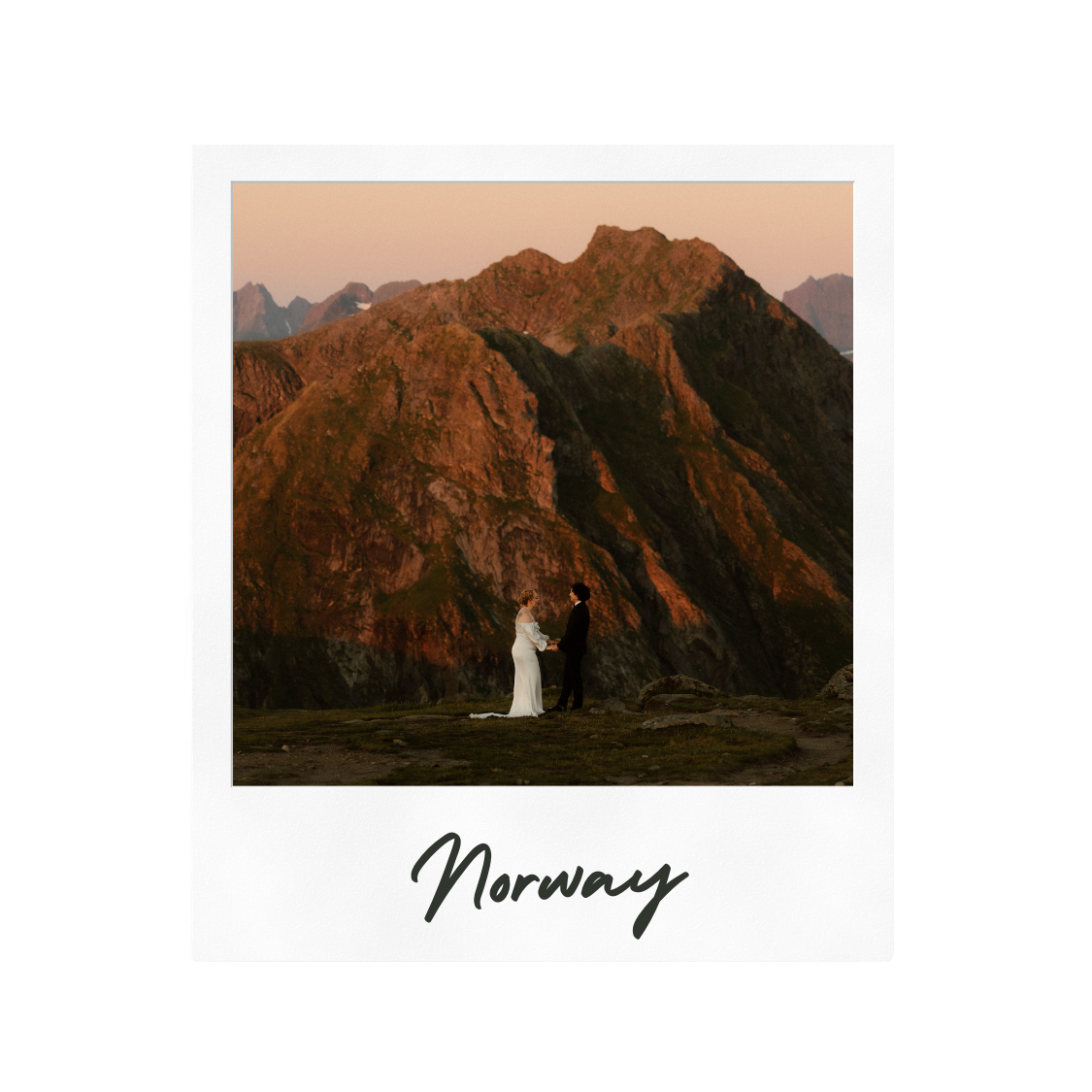 A wedding couple poses against mountainous terrain in Norway during sunset.