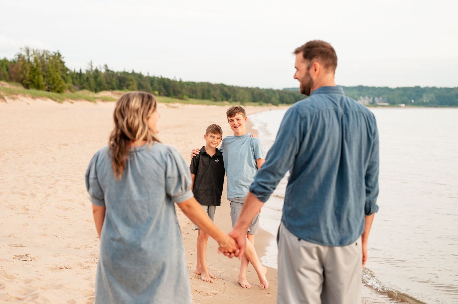 Northern Michigan in Petoskey on the beach with for a family session in the summer.