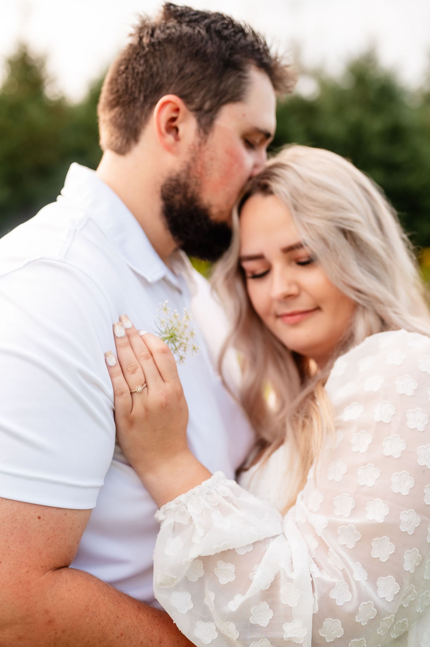 Intimate close-up moments captured during romantic outdoor photo session.