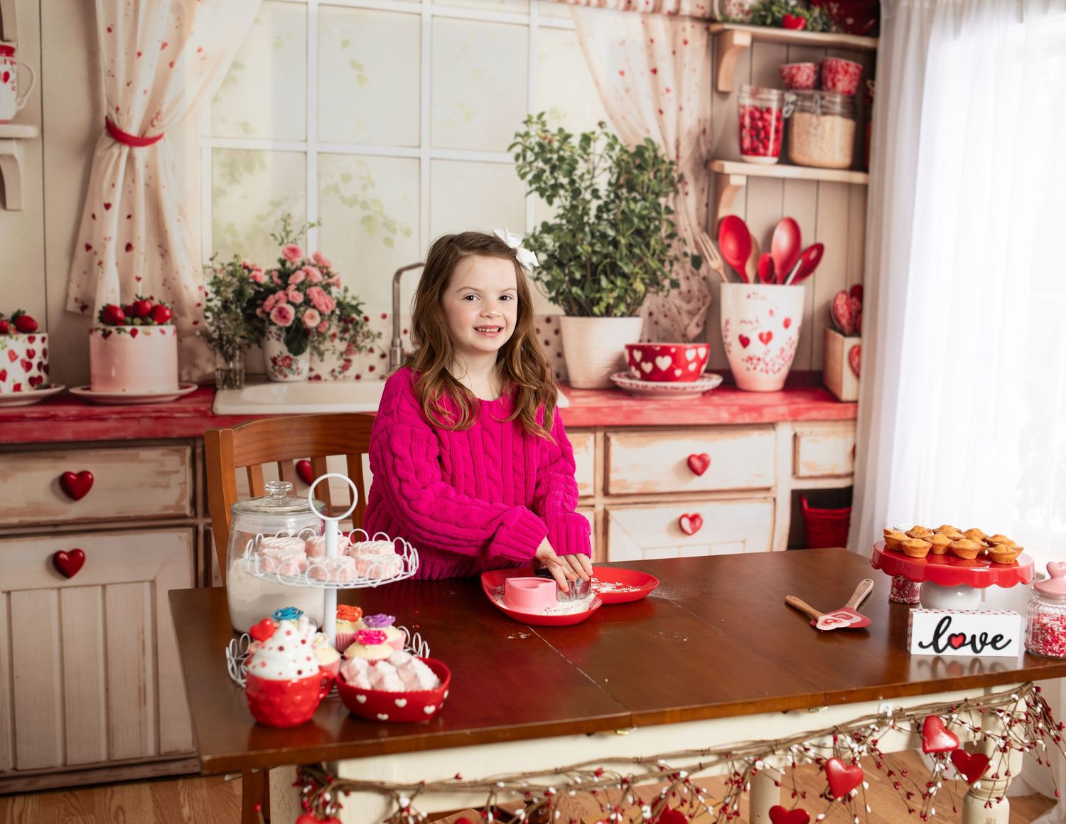 Valentine's day themed kitchen setting with red and pink decor and heart motifs.