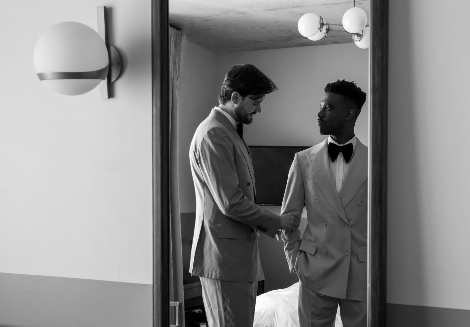 Black and white photos showing intimate wedding preparation moments.