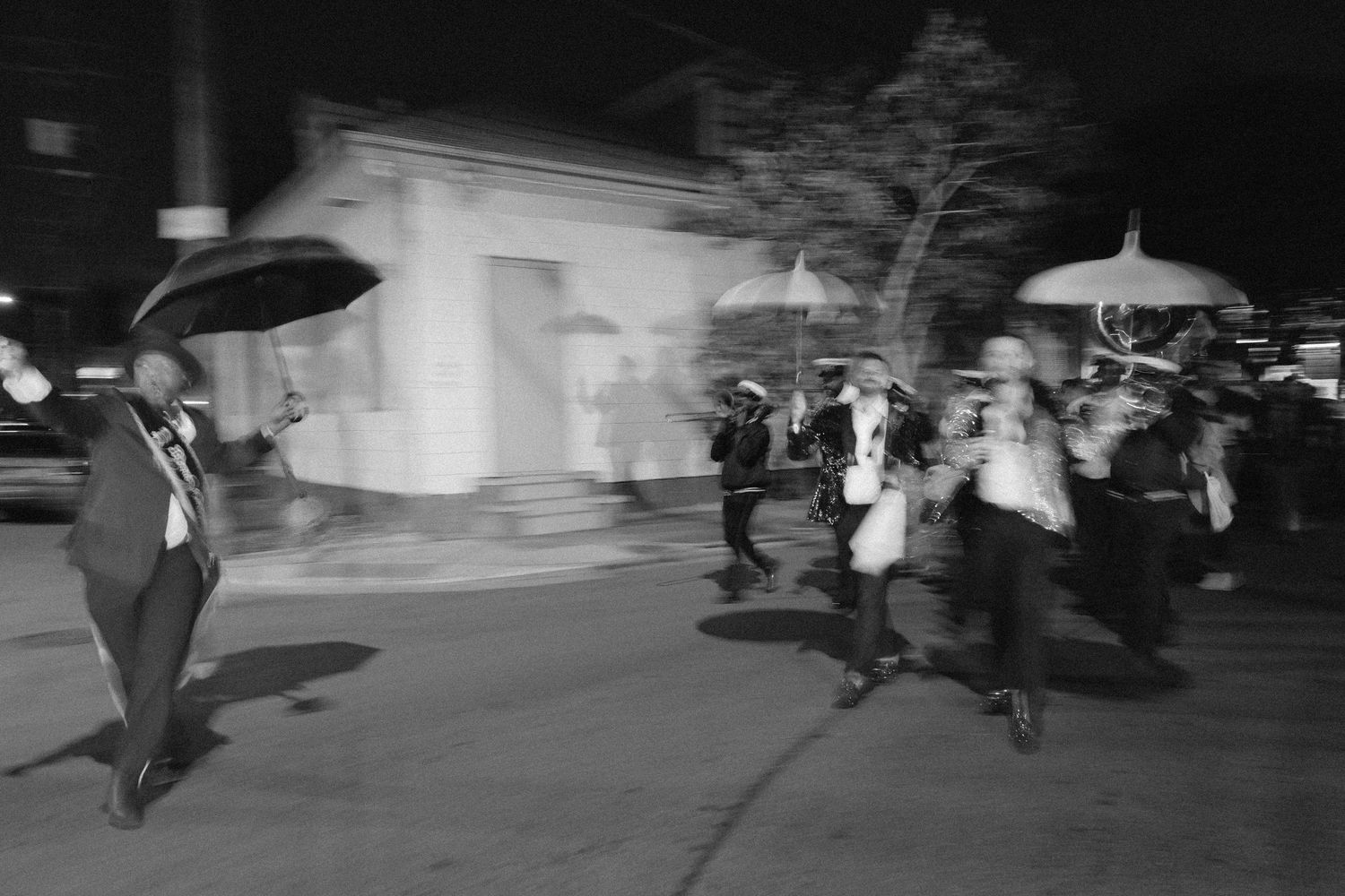 New Orleans second line wedding procession, film photography by Palm Meadow Weddings