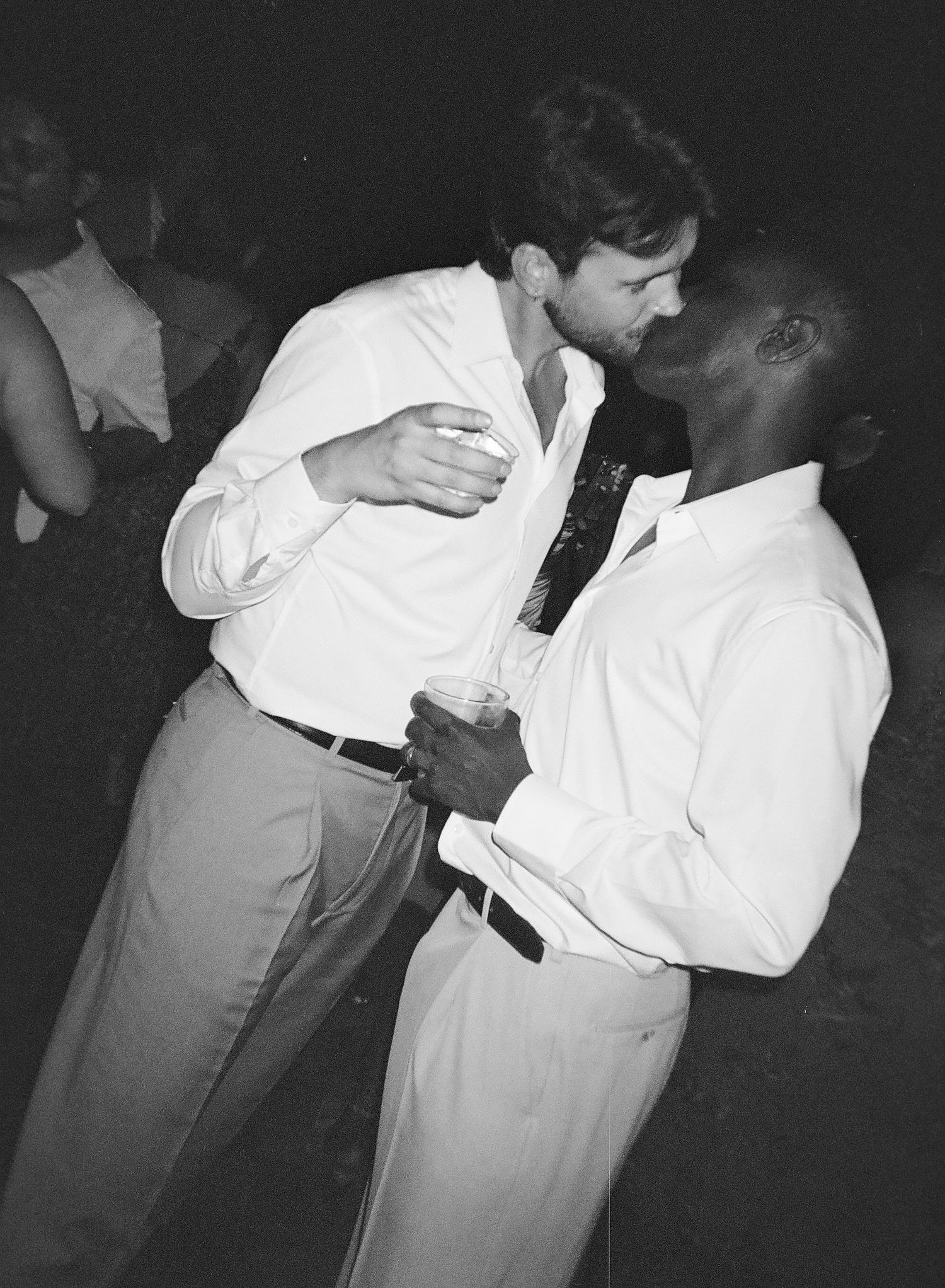 Couple kissing at wedding, documentary wedding photography by Palm Meadow Weddings New Orleans