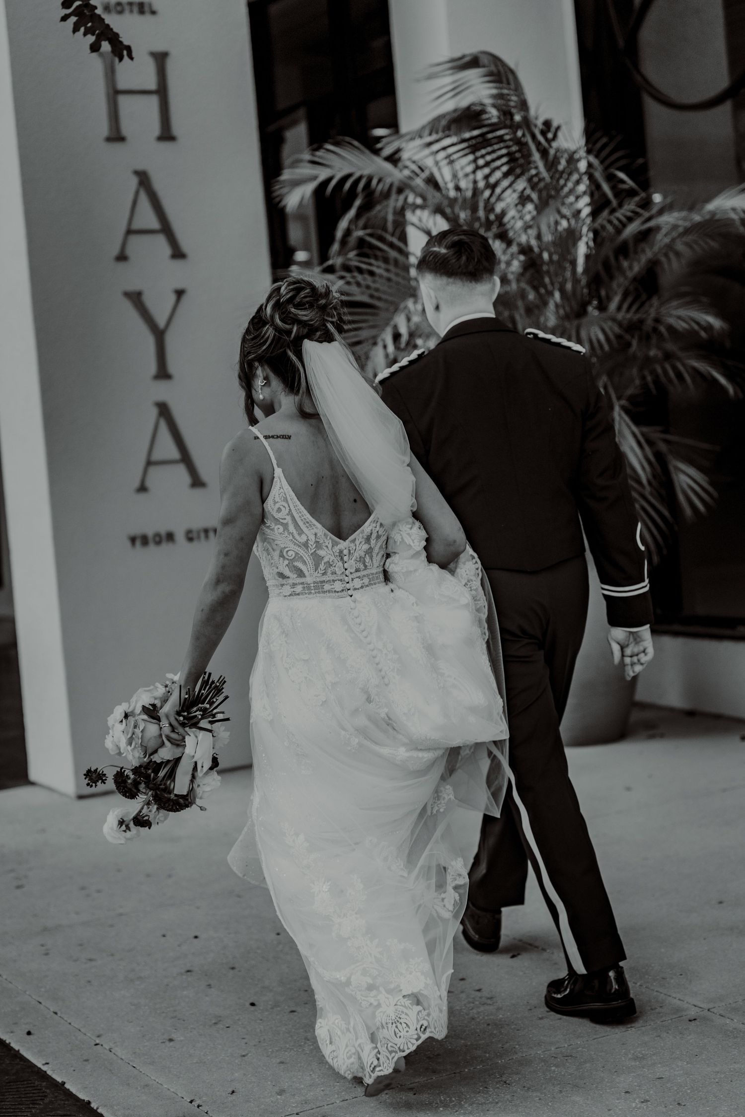 Black and white photos showing the bottom half of a wedding dress as someone walks.