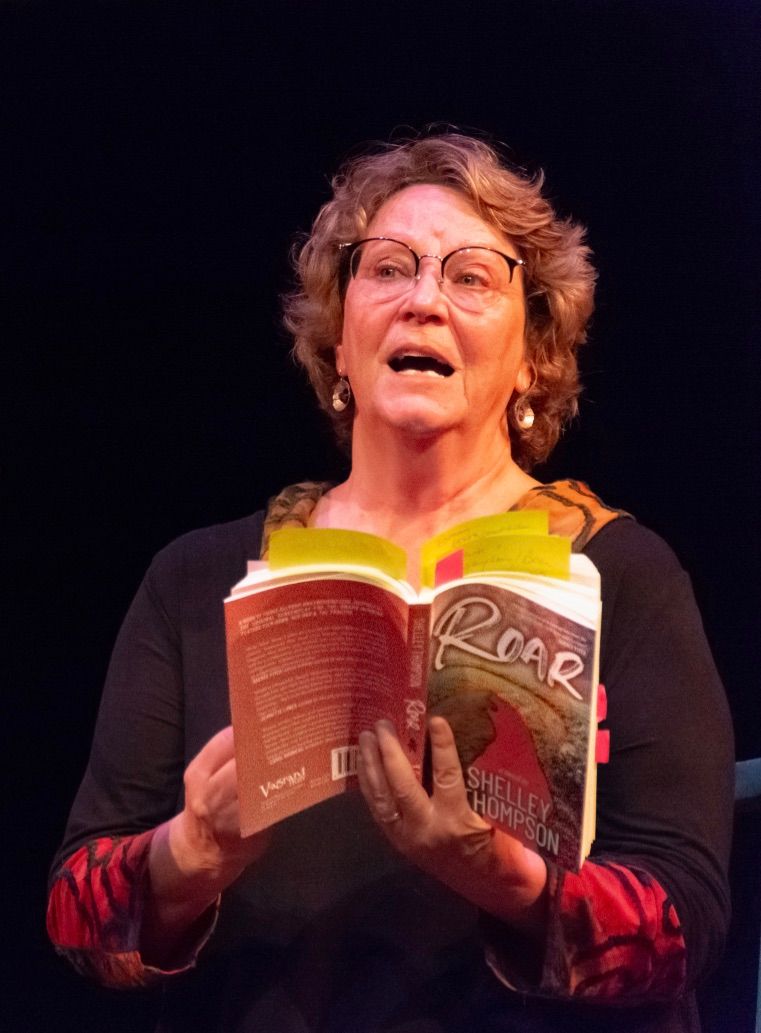 Shelley Thompson reading from ROAR in a black box theatre