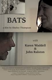 BATS Short Film Cover - A man and a woman face one another