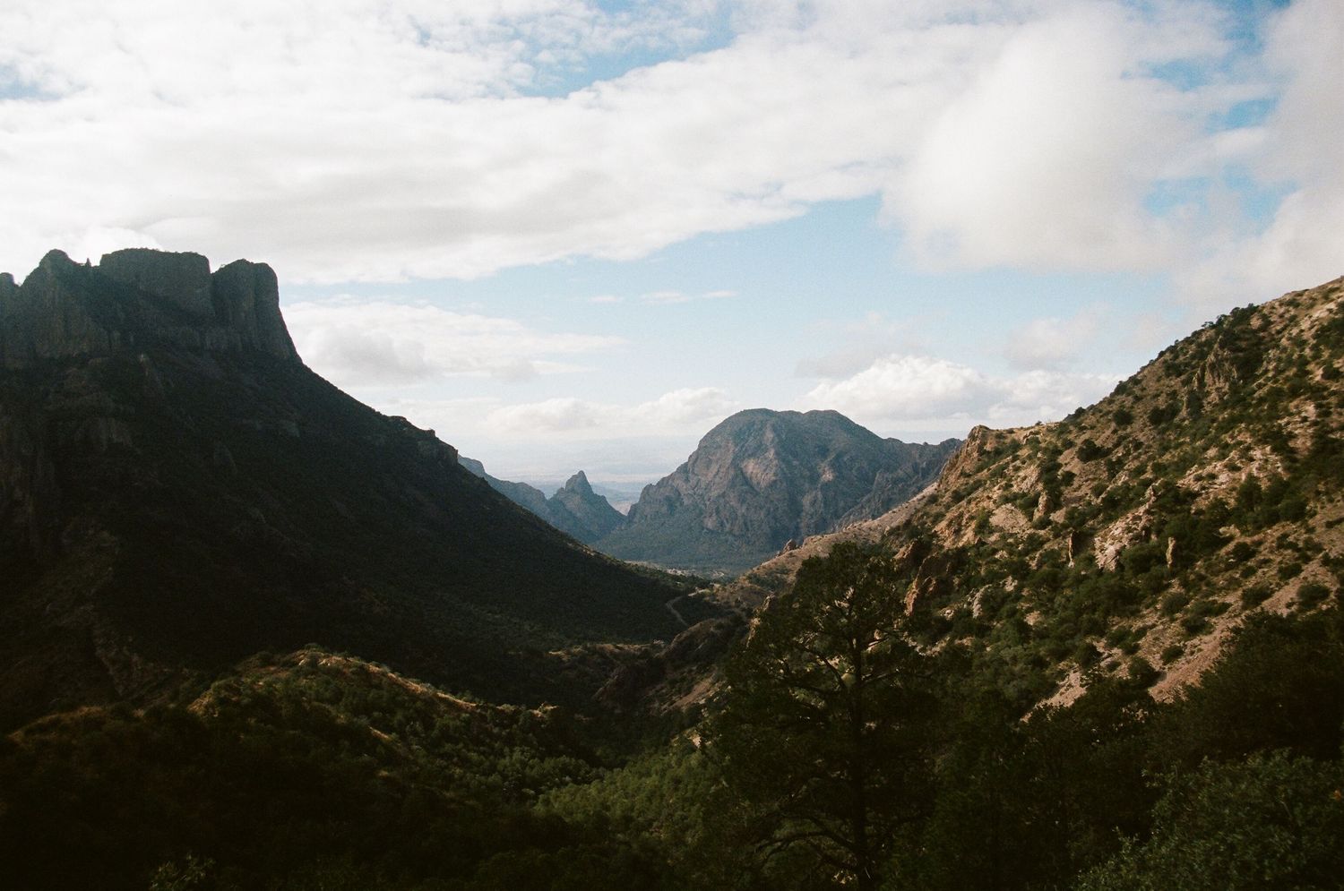 film photo of mountains and blue sky