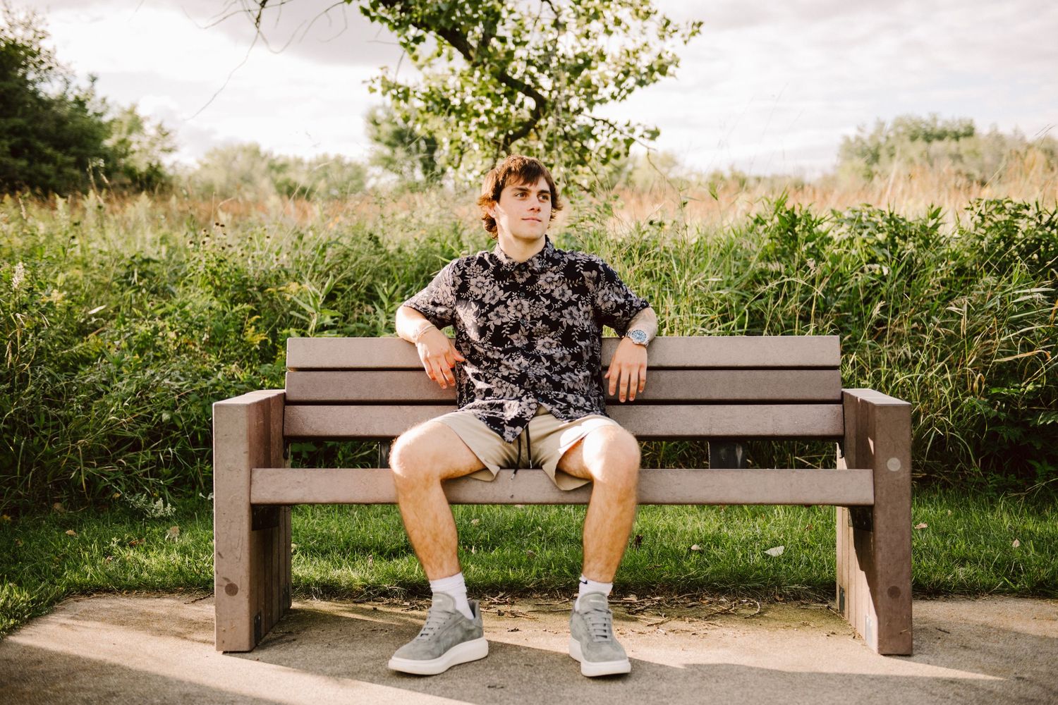 high school senior guy on bench
