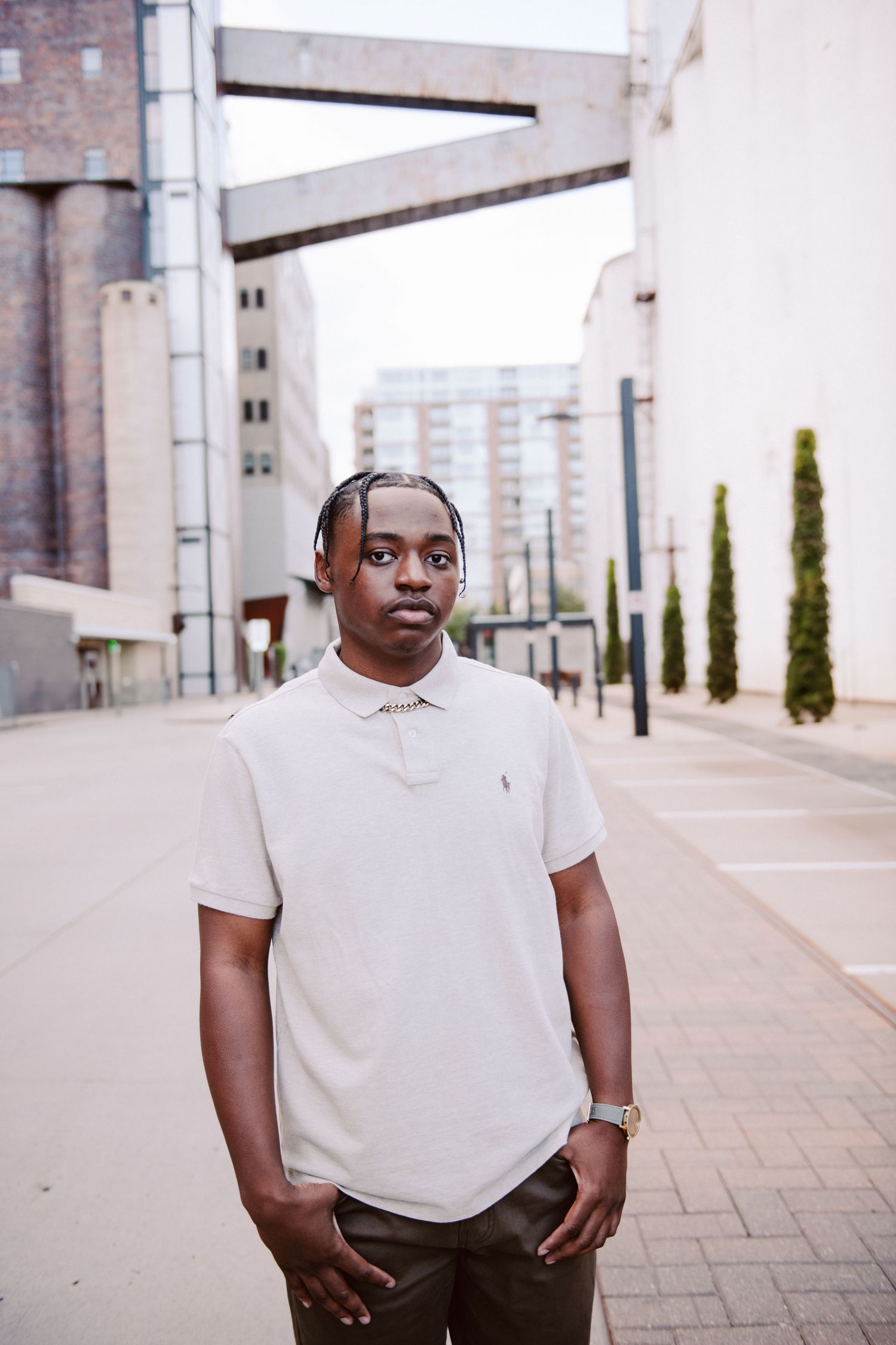 senior guy pictures in minneapolis walking down street