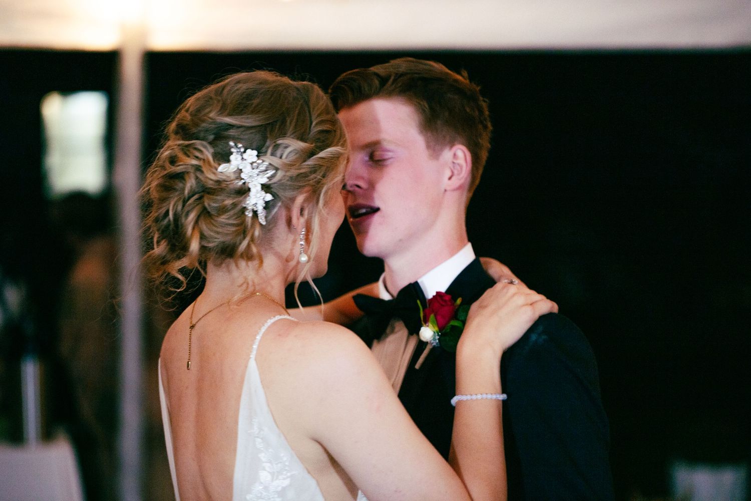 wedding first dance between bride and groom