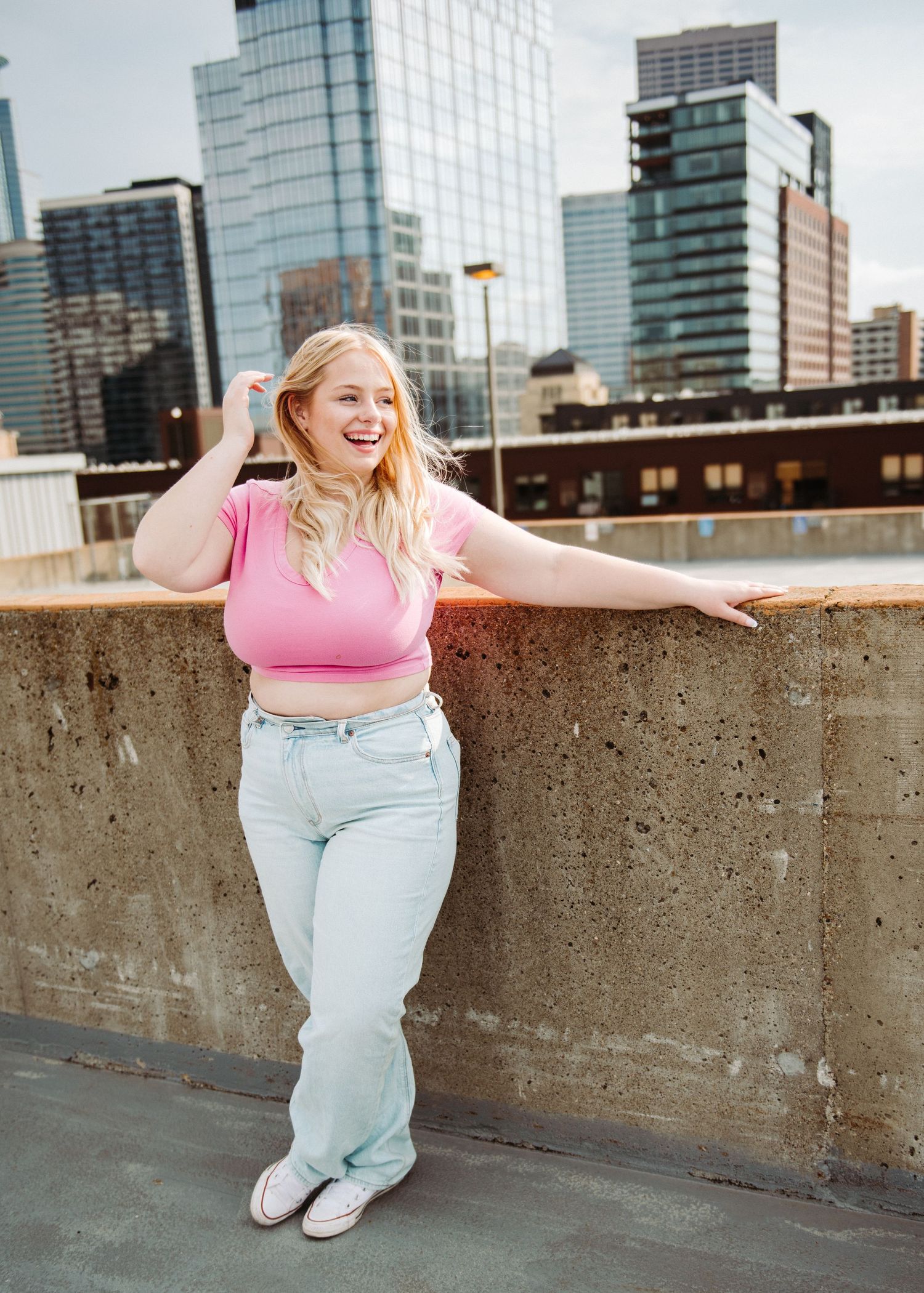 high school senior girl pictures on rooftop in minneapolis