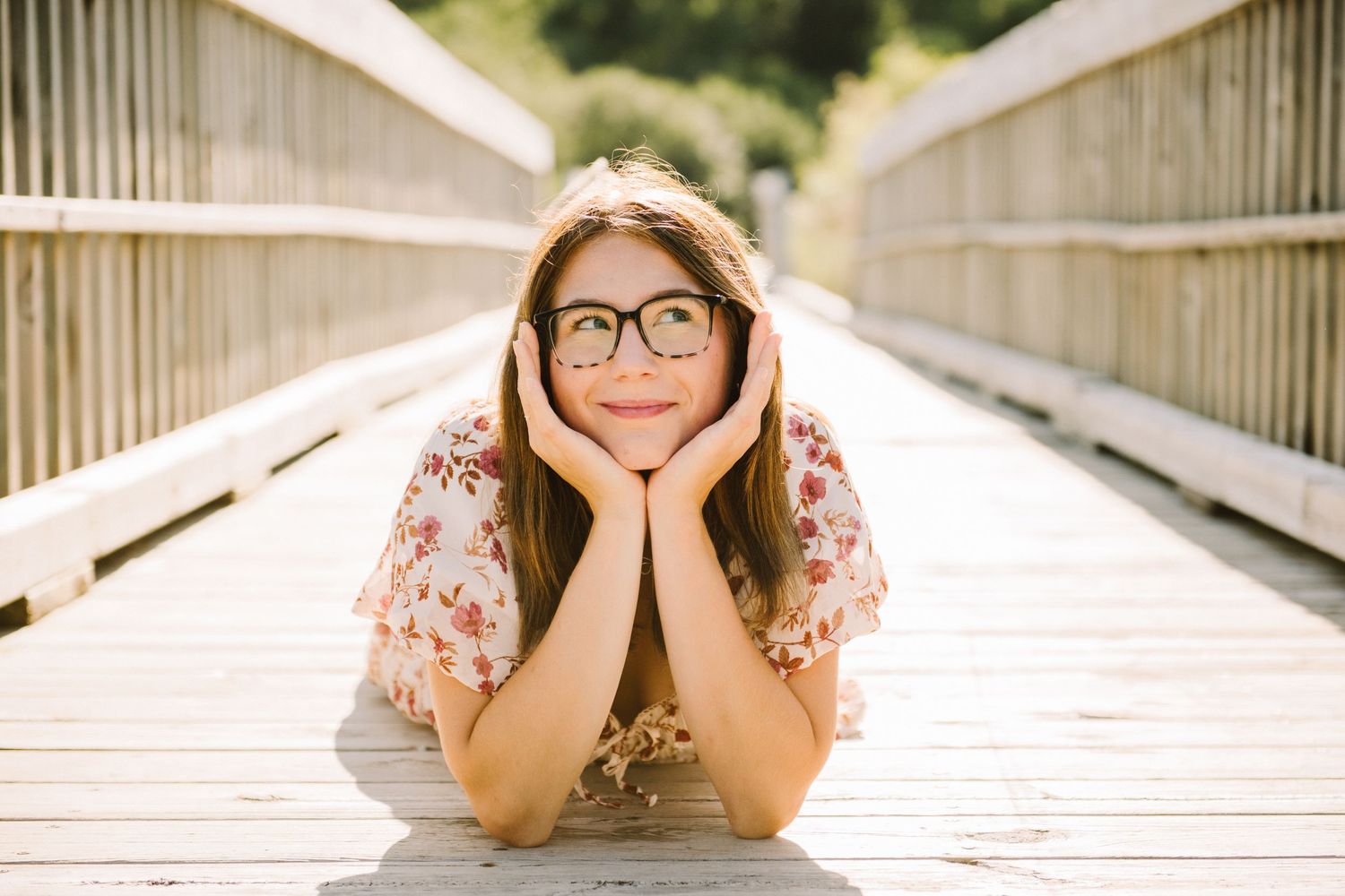 high school senior girl on bridge